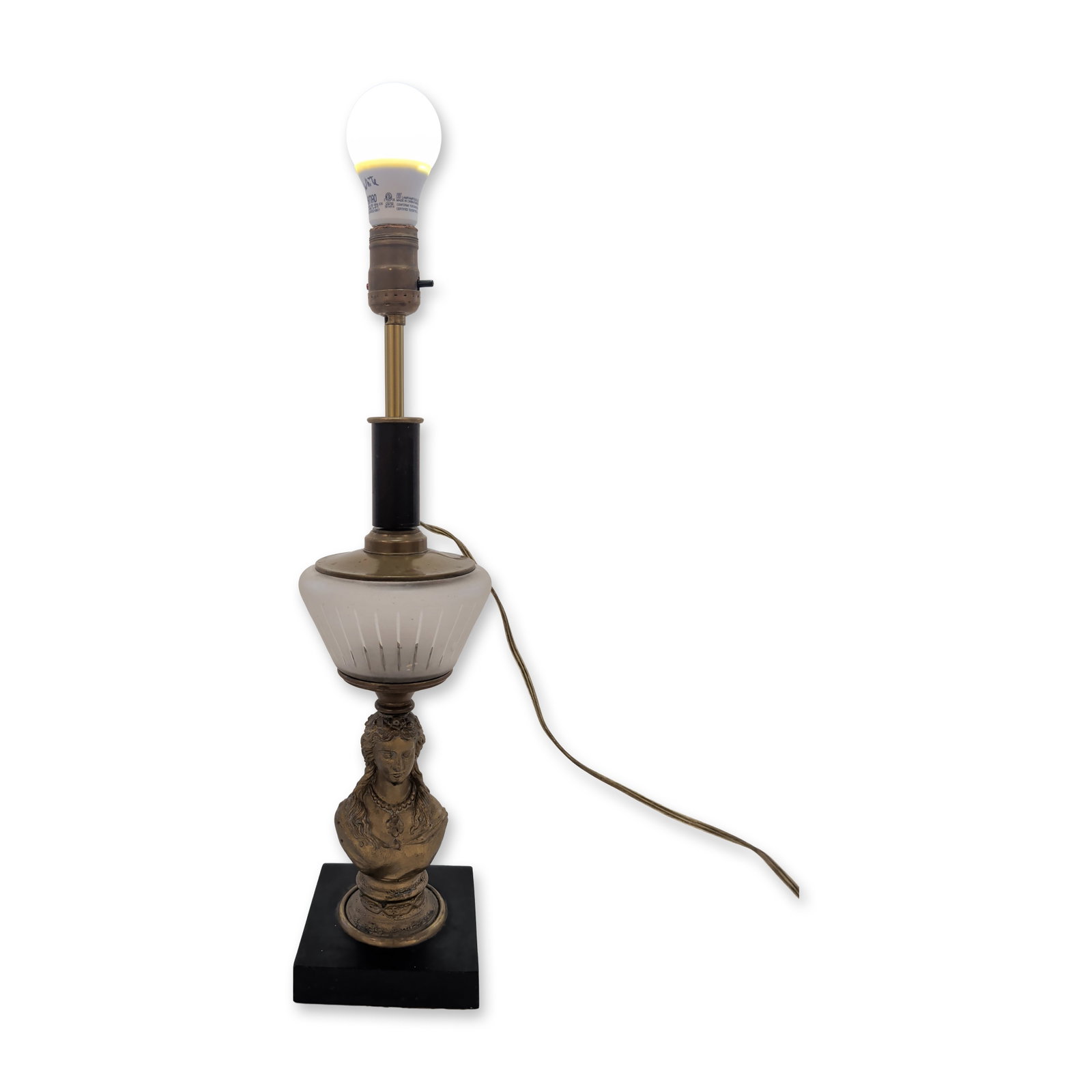 Hollywood Regency Cast Metal Bust Torchiere Lamp: This mid-century Hollywood Regency table lamp features a cast metal bust of a woman in classical dress, with detailed hair and a pearl-style necklace. The distressed gold-tone finish sits atop a tiere