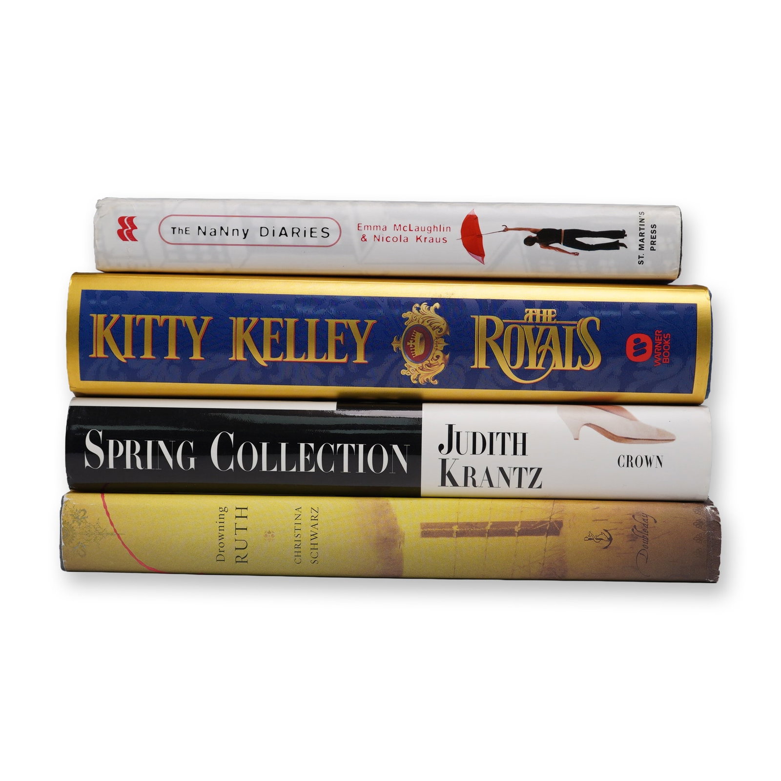 4-Piece Grouped Modern Hardcover Novels: A reference and reading group centered on 4-Piece Grouped Modern Hardcover Novels. A group of four modern hardcover novels including The Nanny Diaries by Emma McLaughlin and Nicola Kraus, The Royals b