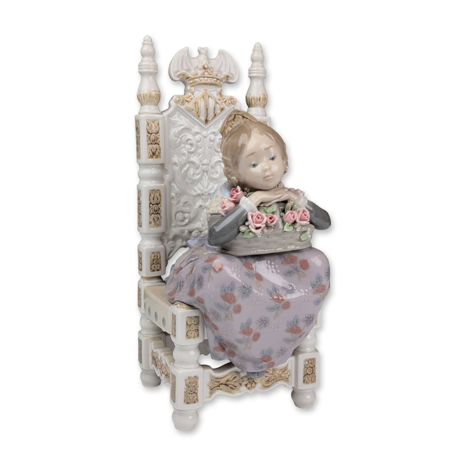 Lladro Glazed Porcelain Figurine, Reverie 01001398: Lladro Spanish glazed porcelain figurine titled Reverie, model number 1398, designed by sculptor Salvador Debon. The figural group depicts a young girl wearing a floral headdress seated in an ornate h