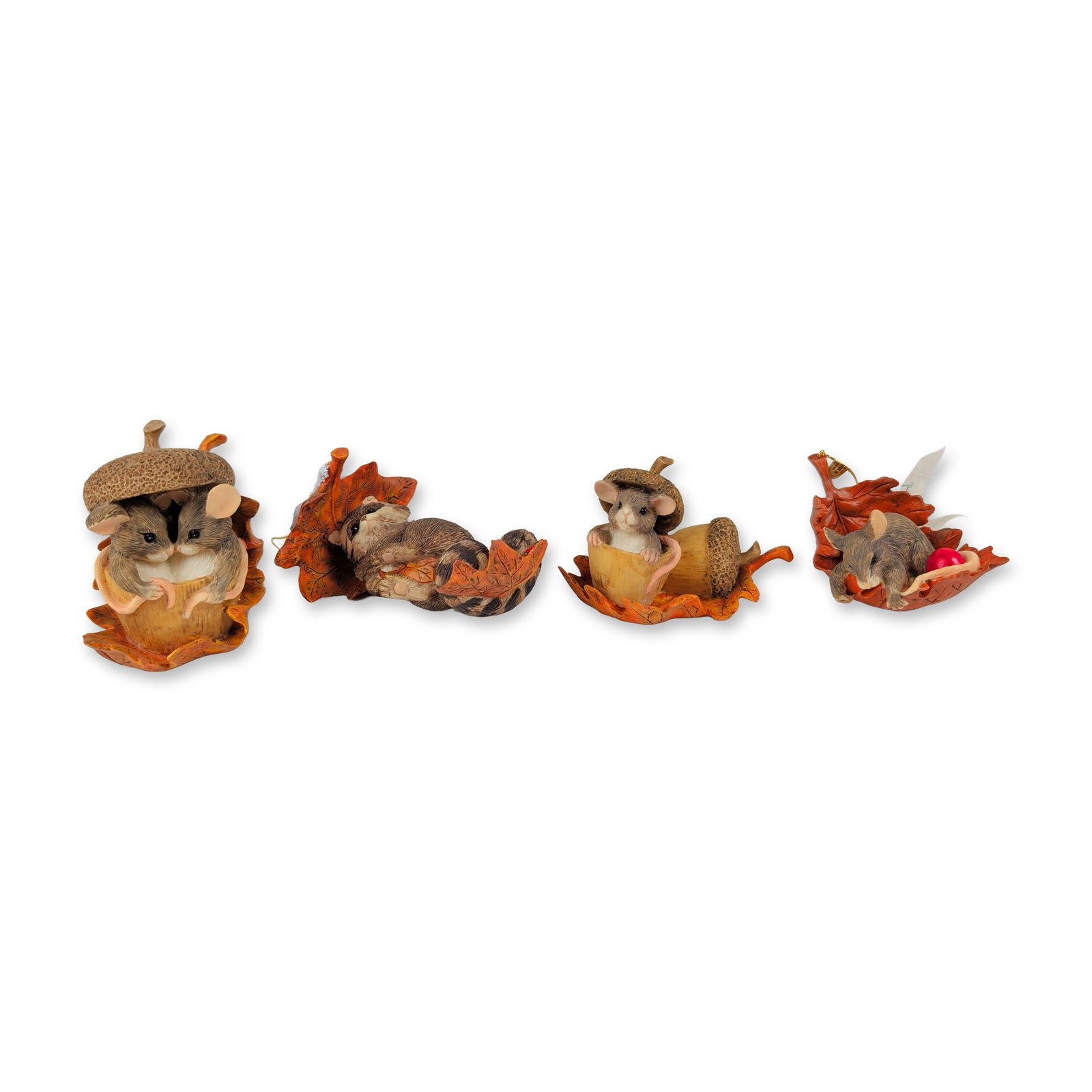 4pc Charming Tails Resin Autumn Ornaments and Figurines: Designed by Dean Griff for the Charming Tails collection. The group is crafted in hand-painted cold-cast resin and includes a mouse on a leaf with a berry, a mouse in an acorn cap, a raccoon on a leaf