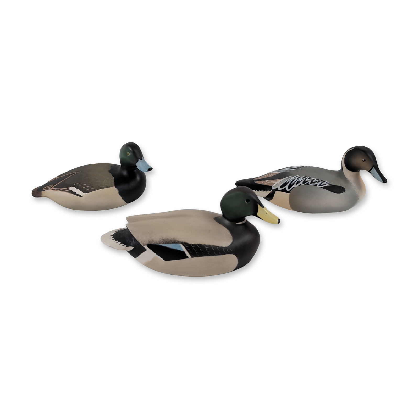 3pc Royal Doulton Lem Ward Duck Figurines: Royal Doulton (England) ceramic duck figurines from the Wildfowl Counterfeit series after decoys by artist Lem Ward. Hand-painted matte bisque finish depicting a Mallard Drake, a Pintail Drake, and a 