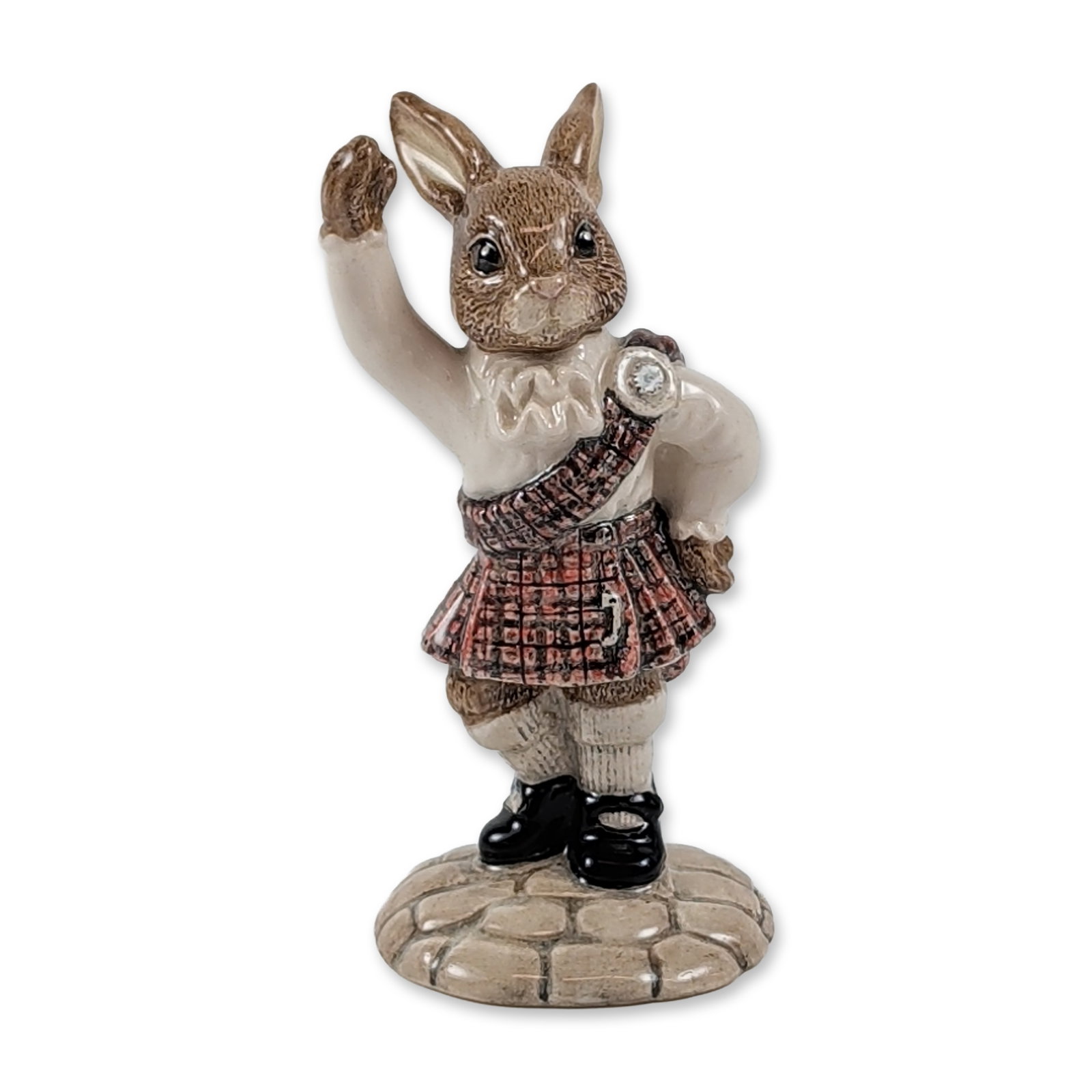 Royal Doulton Prototype Scotsman Bunnykins Fine Porcelain Figurine: This Royal Doulton Scotsman Bunnykins prototype is made from fine porcelain and hand-painted in a rare experimental factory colorway. The rabbit, ears fully visible, sports an unreleased design and is