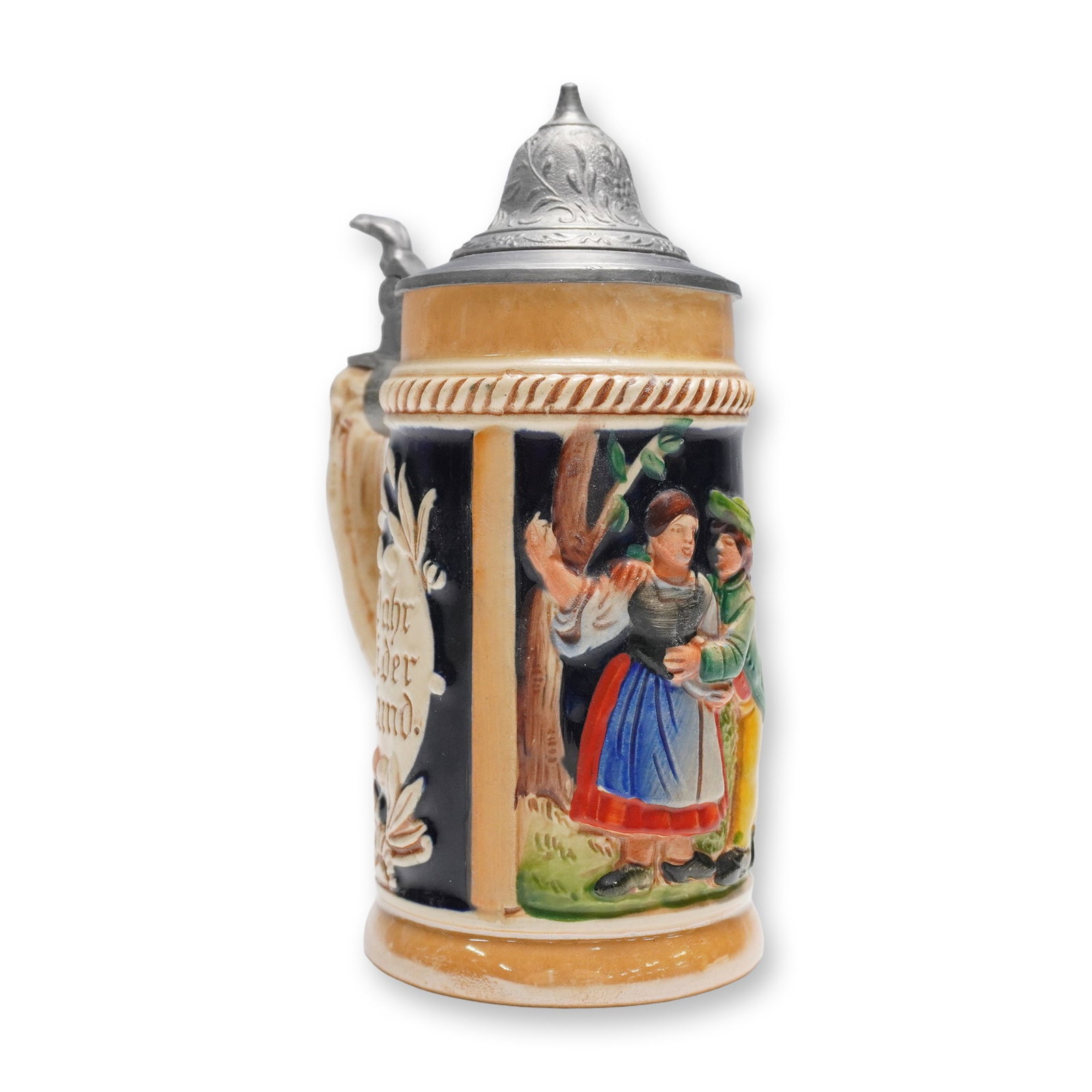 West German Collectible Beer Stein, Hand-Painted with Pewter Lid: A collectible highlighting West German Collectible Beer Stein, Hand-Painted with Pewter Lid. Vintage beer stein marked Made in West Germany, showcasing a hand-painted relief scene of a courting couple