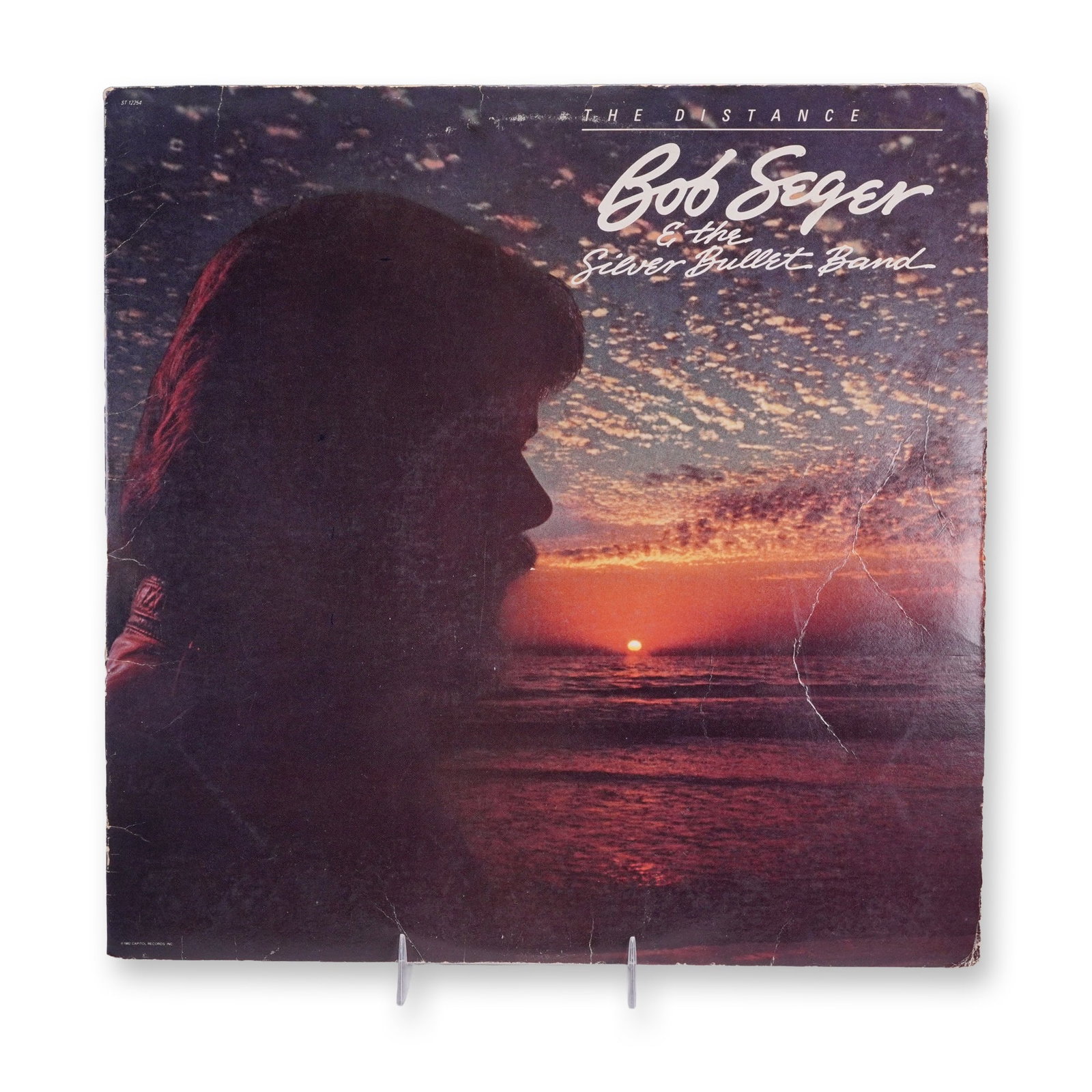 Bob Seger and the Silver Bullet Band Vintage Vinyl Record, The Distance: A presentation of Bob Seger and the Silver Bullet Band Vintage Vinyl Record, The Distance, emphasizing the performer, label, genre, and vintage media appeal. A classic vinyl of Bob Seger and the Silve