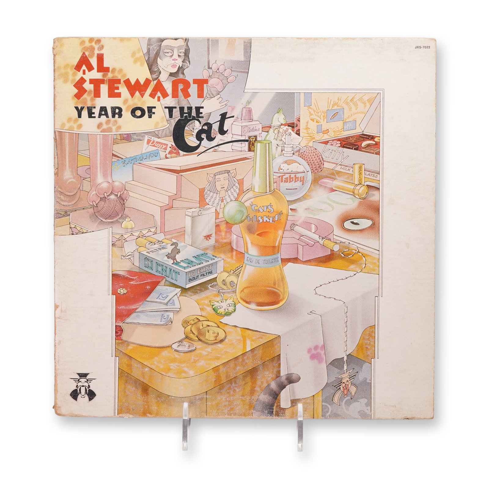 Janus Records Al Stewart Vintage Vinyl Record, Year of the Cat: A presentation of Janus Records Al Stewart Vintage Vinyl Record, Year of the Cat, emphasizing the performer, label, genre, and vintage media appeal. 12-inch vinyl record album titled "Year of the Cat"