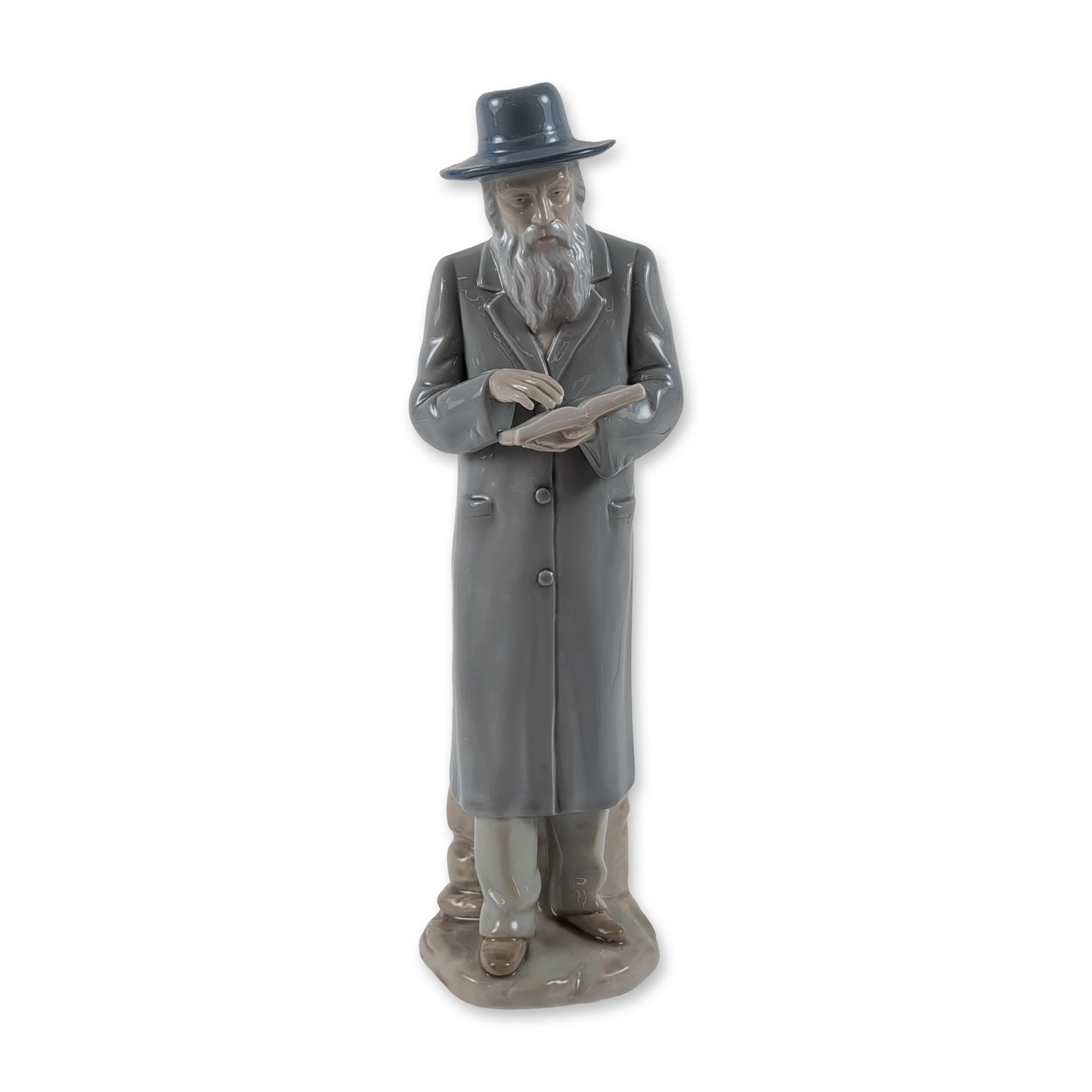 KPM Conte Porcelain Rabbi Figurine: Featuring a standing rabbi or scholar. The figure is rendered in glazed polychrome porcelain, depicted with a full white beard and wearing a wide-brimmed grey hat with a coordinating full-length overc