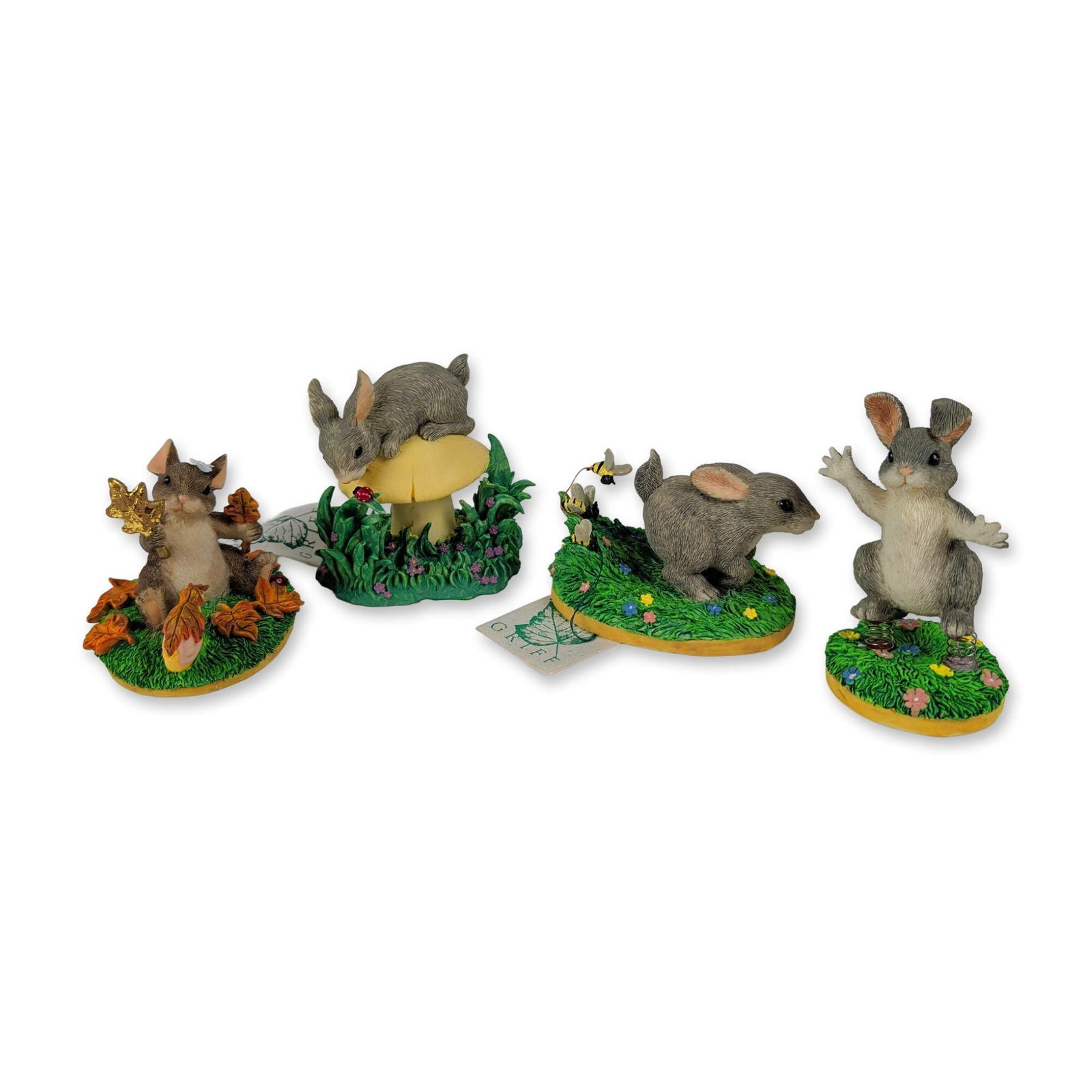 4pc Silvestri Charming Tails Mouse Figurines Collection: Silvestri hand-painted cast resin mouse figurines from the Charming Tails series designed by Dean Griff. The collection includes four distinct scenes: Hoppity Hop, The Chase Is On!, Maxine's Leaf Coll