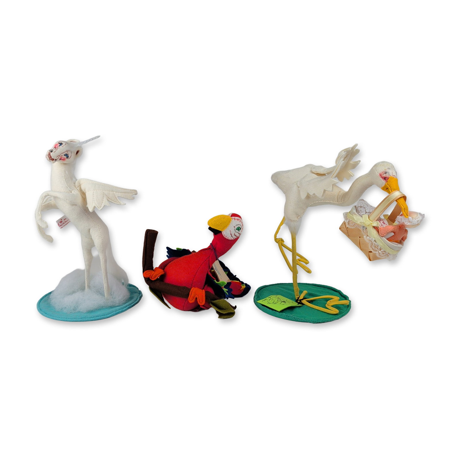3pc Annalee Mobilitee Felt Poseable Figures: Annalee Mobilitee Dolls. Three handcrafted poseable felt figures with internal wire armatures and hand-painted facial features. The group includes a white stork with long yellow wire legs carrying a w
