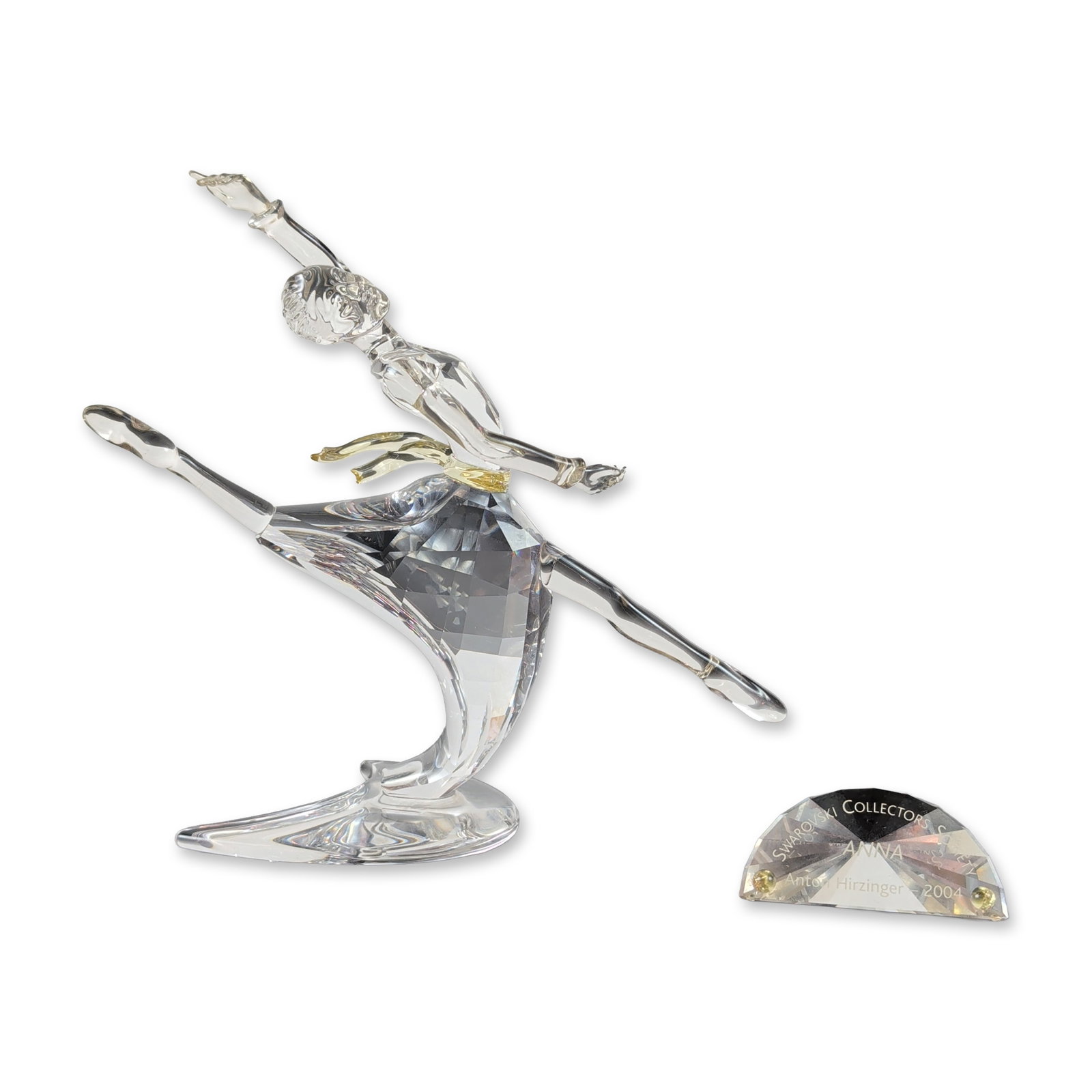 Swarovski SCS 2004 Anna Crystal Figurine with Plaque: Swarovski SCS 2004 Annual Edition figurine titled Anna, designed by Anton Hirzinger as part of the Magic of Dance collection. The figure is crafted from faceted clear lead crystal and depicts a ballet