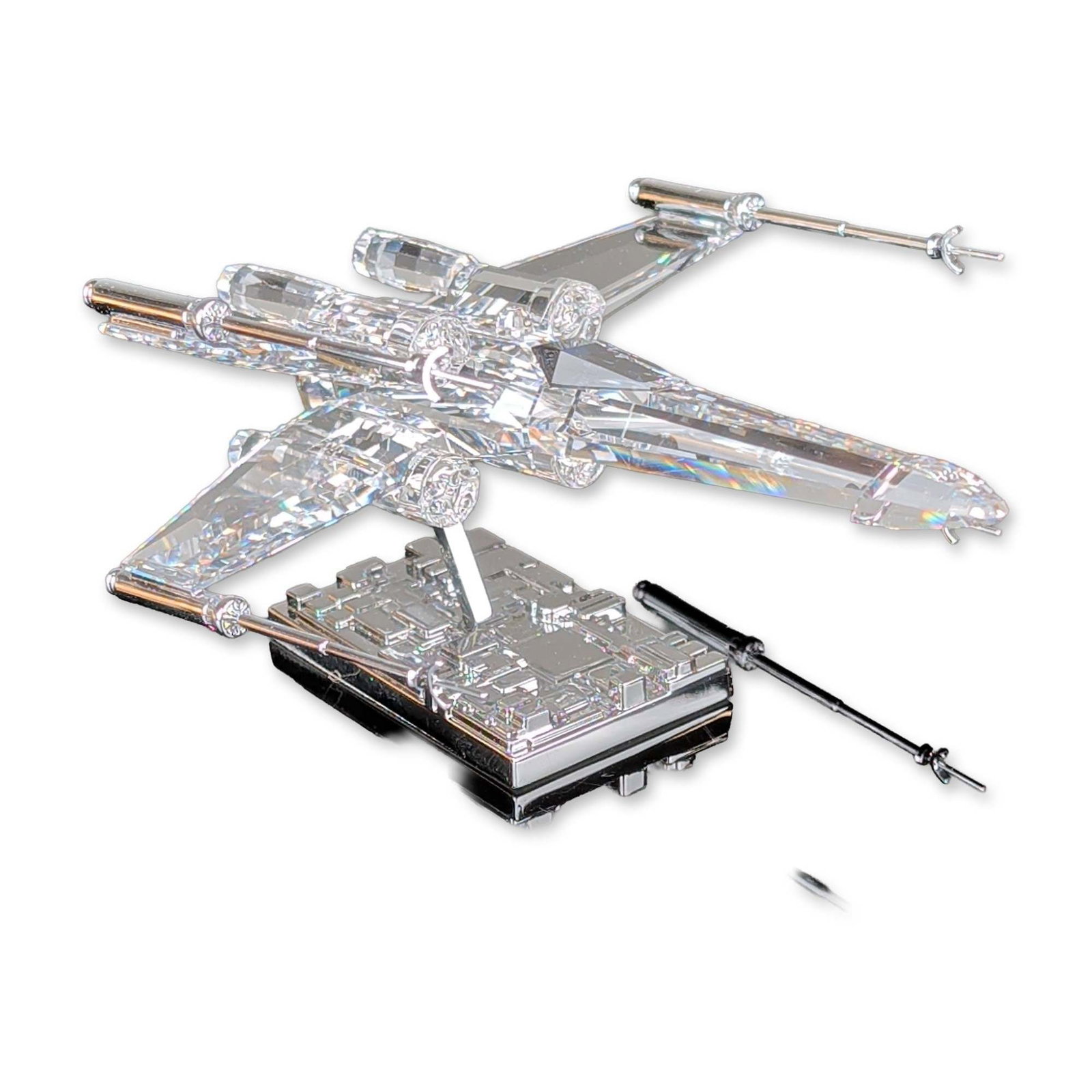 Swarovski Crystal Star Wars Figurine, X-Wing Starfighter 5506805: Star Wars X-Wing Starfighter figurine in faceted clear crystal with polished metal accents, produced in collaboration with Lucasfilm Ltd. (LFL). Modeled after the T-65 X-Wing Starfighter, the figurine