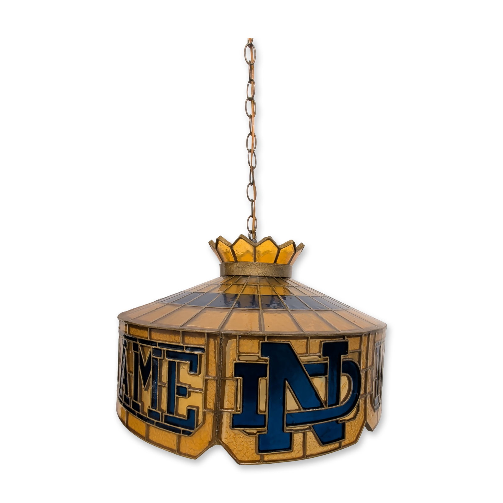 Vintage University of Notre Dame Fighting Irish Tiffany-Style Stained Resin Hanging Pub Lamp: This University of Notre Dame hanging pub lamp is styled in a traditional Tiffany-inspired aesthetic. The handcrafted shade features stained resin panels displaying the official Fighting Irish navy bl