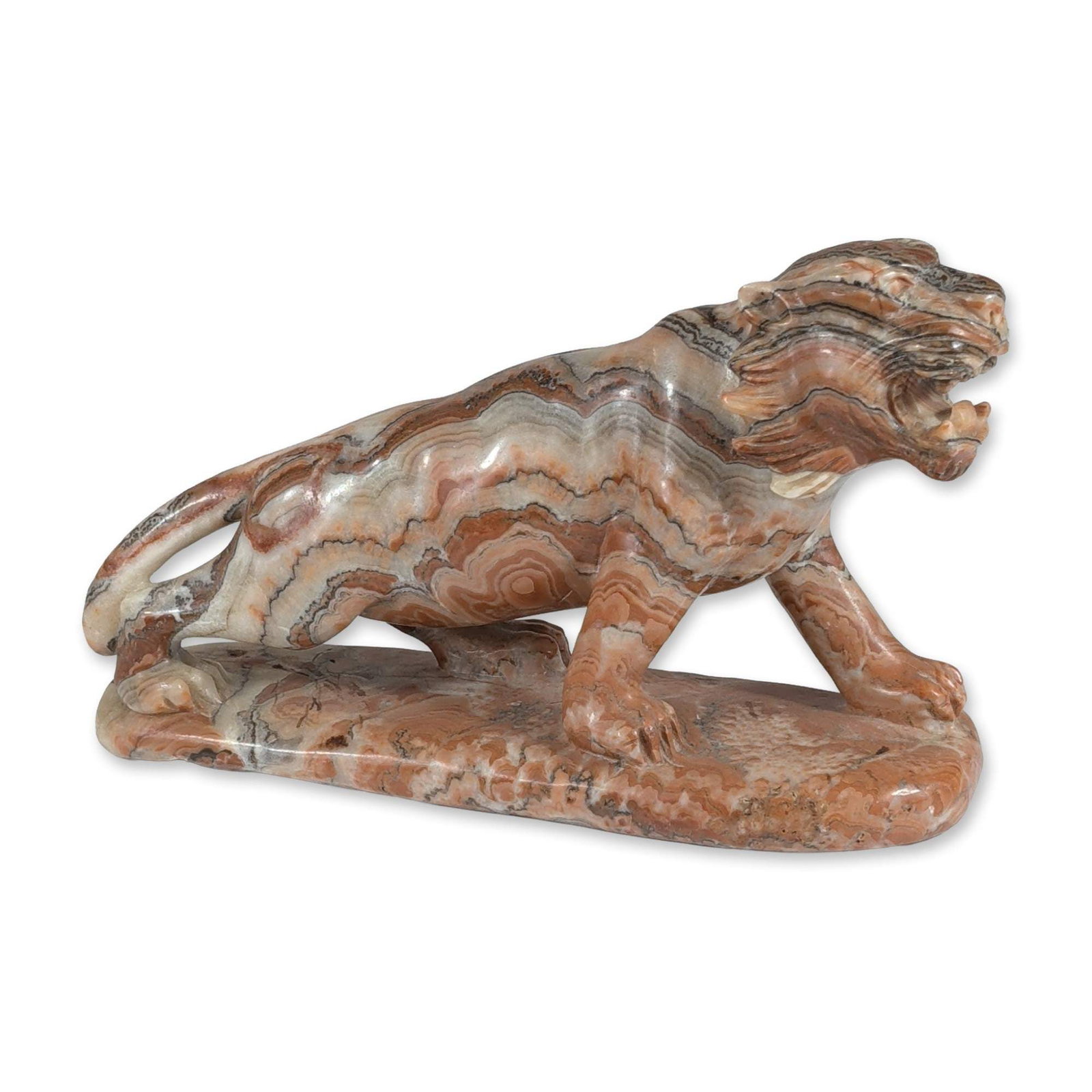 Mid-20th Century Carved Banded Onyx Lion Sculpture: Mid-20th century, Mexican style. Carved banded onyx sculpture depicting a roaring lion in a dynamic, lunging pose atop an integral rocky-form base. The stone displays natural concentric banding in sha