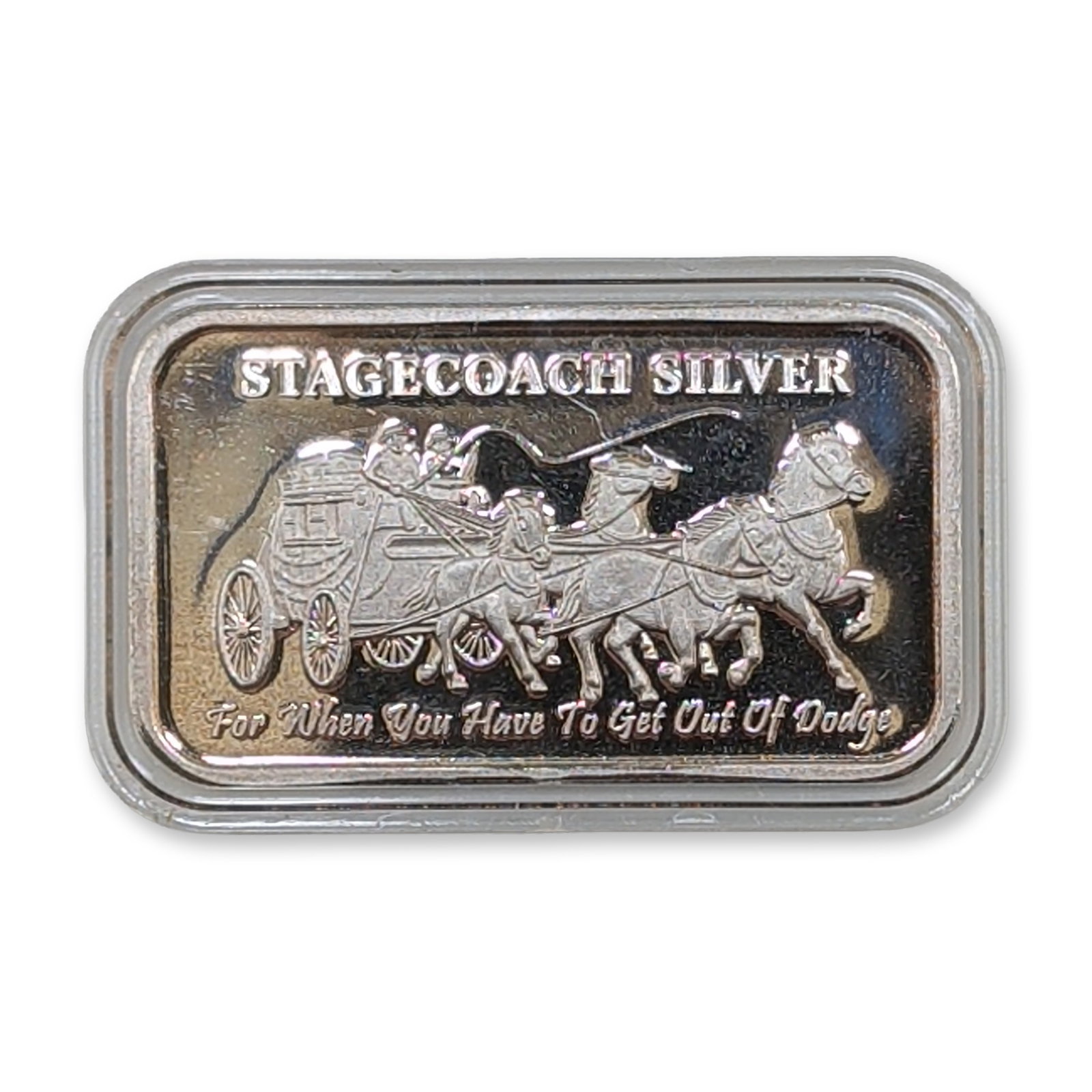 Stagecoach 1 oz .999 Fine Silver Divisible Bullion Bar: Stagecoach Silver. Bullion bar in .999 fine silver, featuring a divisible design. The obverse depicts a horse-drawn stagecoach with vertical text STAGECOACH SILVER and a script inscription reading For