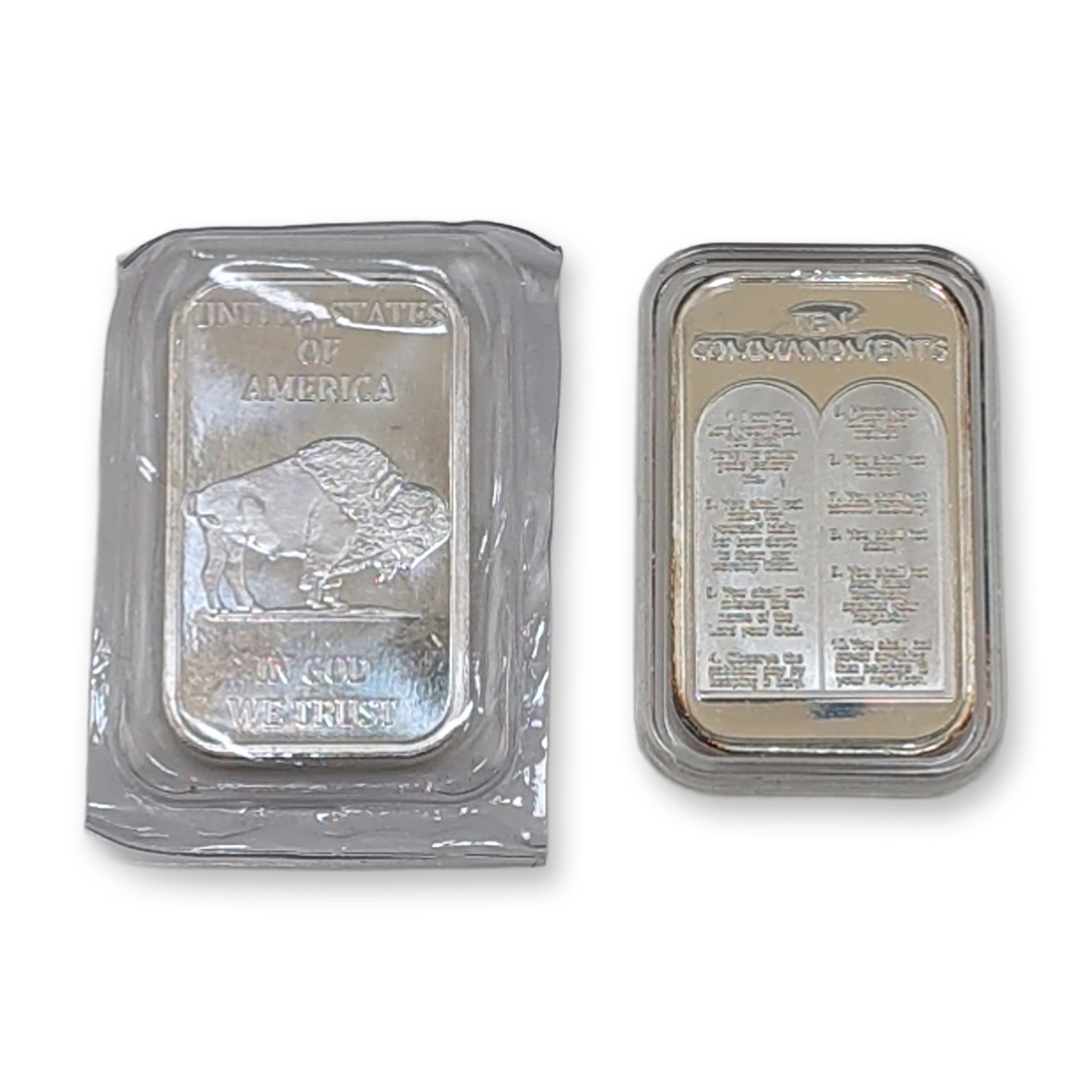2pc Buffalo and Ten Commandments .999 Fine Silver Bullion Bars: Pair of rectangular .999 fine silver bars, each weighing one troy ounce. The first bar features the Ten Commandments depicted as two tablets on the obverse with a small pictorial mark above, and a rev
