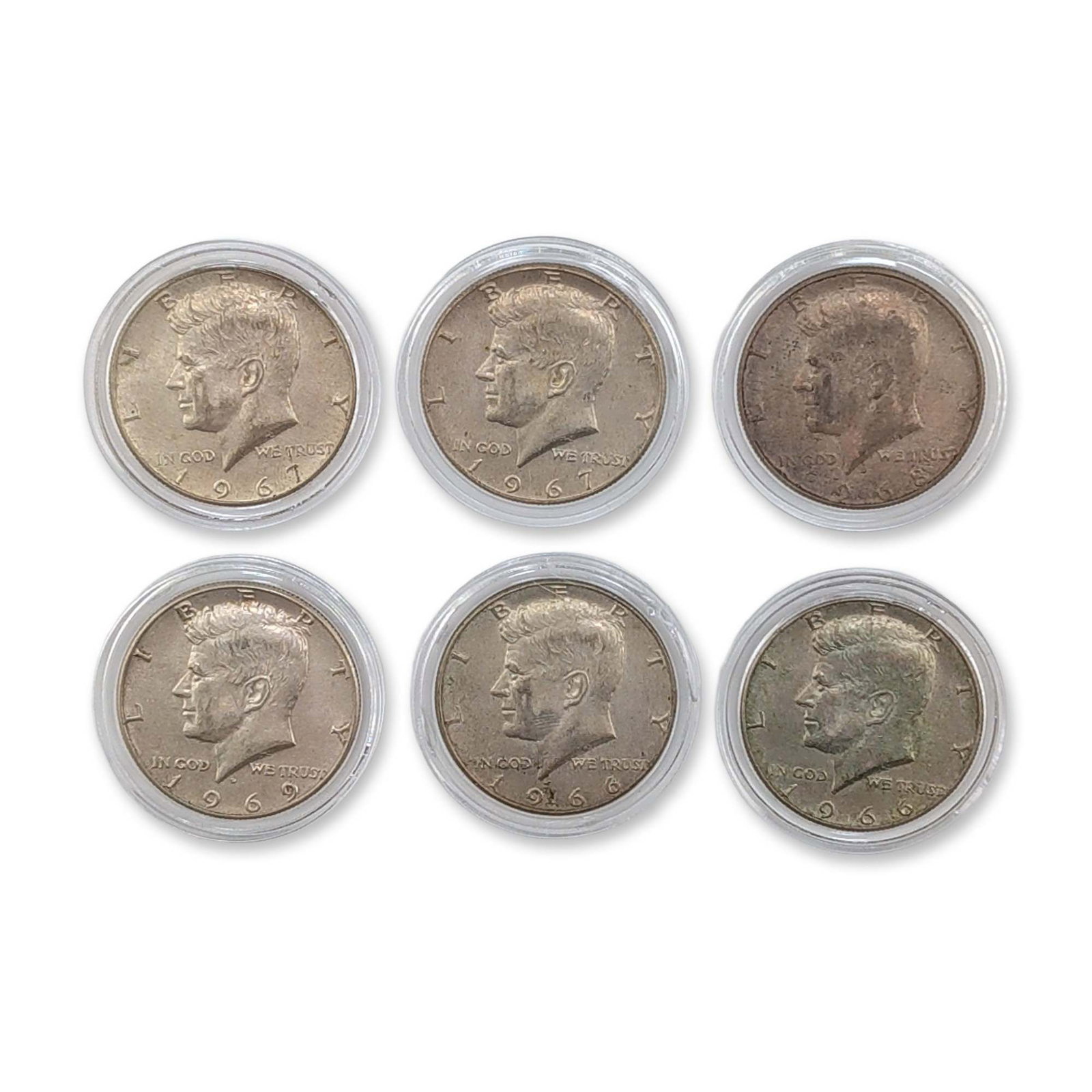 6pc US Silver Kennedy Half Dollars: Group of US Kennedy half dollars composed of 90% silver clad layers. The collection includes examples dated 1967, 1968-D, and 1969-D. Obverse features the profile portrait of John F. Kennedy, and the 