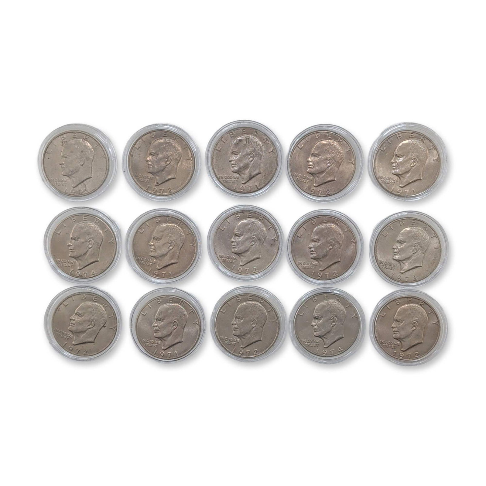 15pc US Eisenhower Dollar Coins: Group of US Eisenhower one-dollar coins, including dates 1971, 1972, and 1974. Struck in copper-nickel clad composition at the Philadelphia and Denver Mints. Features the Eisenhower obverse and Apollo