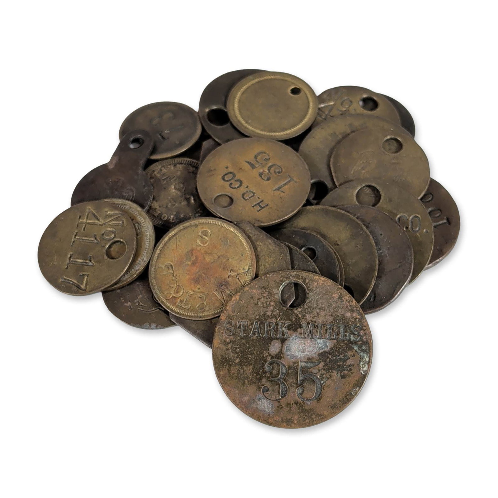 Collection of Vintage Stamped Metal Industrial Tags: Late 19th to early 20th century. Collection of industrial identification tags in stamped brass and copper, including tool checks and employee markers. The assortment features various circular and octa