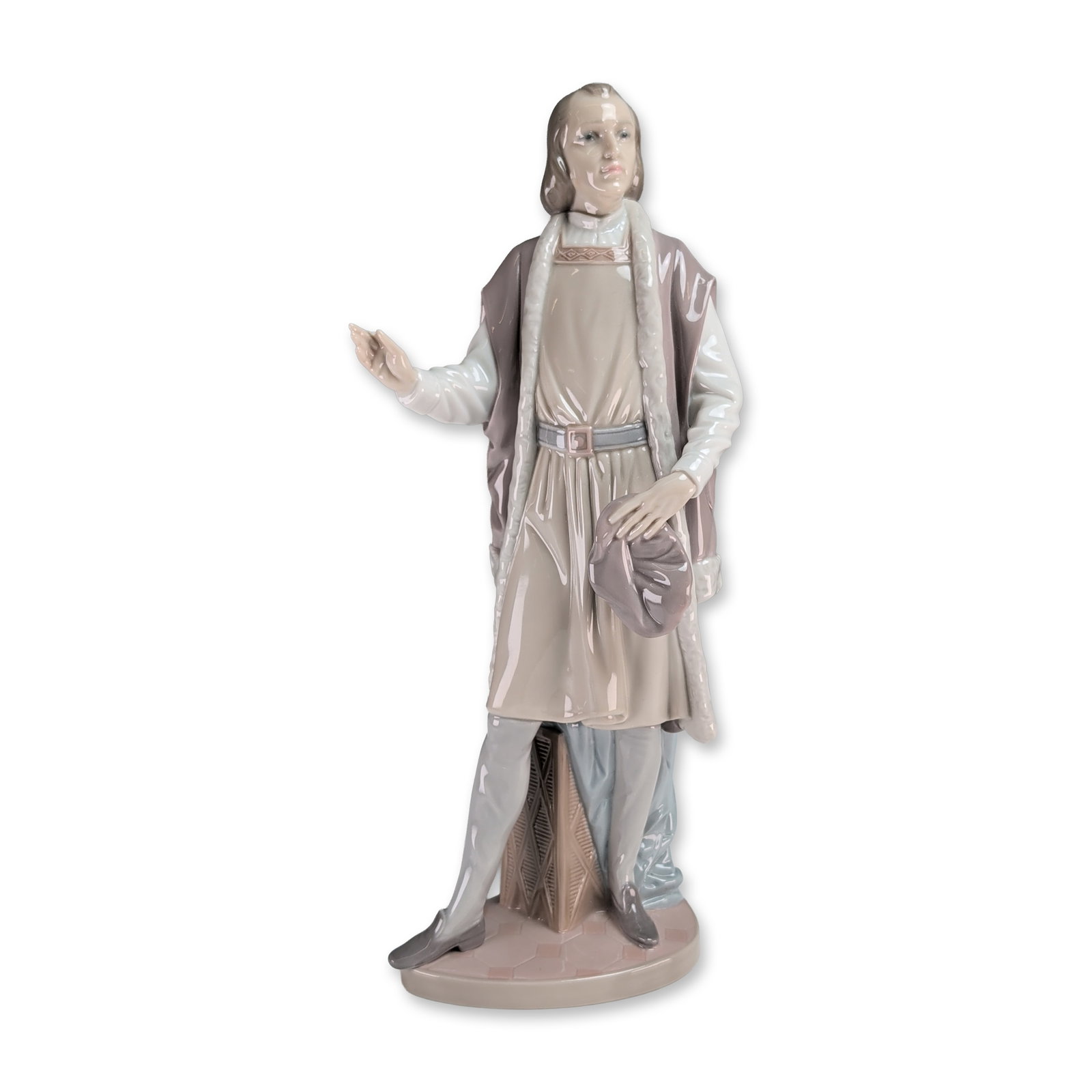 Lladro The Great Adventurer Porcelain Figurine: Spanish Lladro glazed porcelain figurine, model number 5944, titled The Great Adventurer. The figure is depicted in medieval attire including a fur-trimmed tunic, blue belt with square buckle, and lig