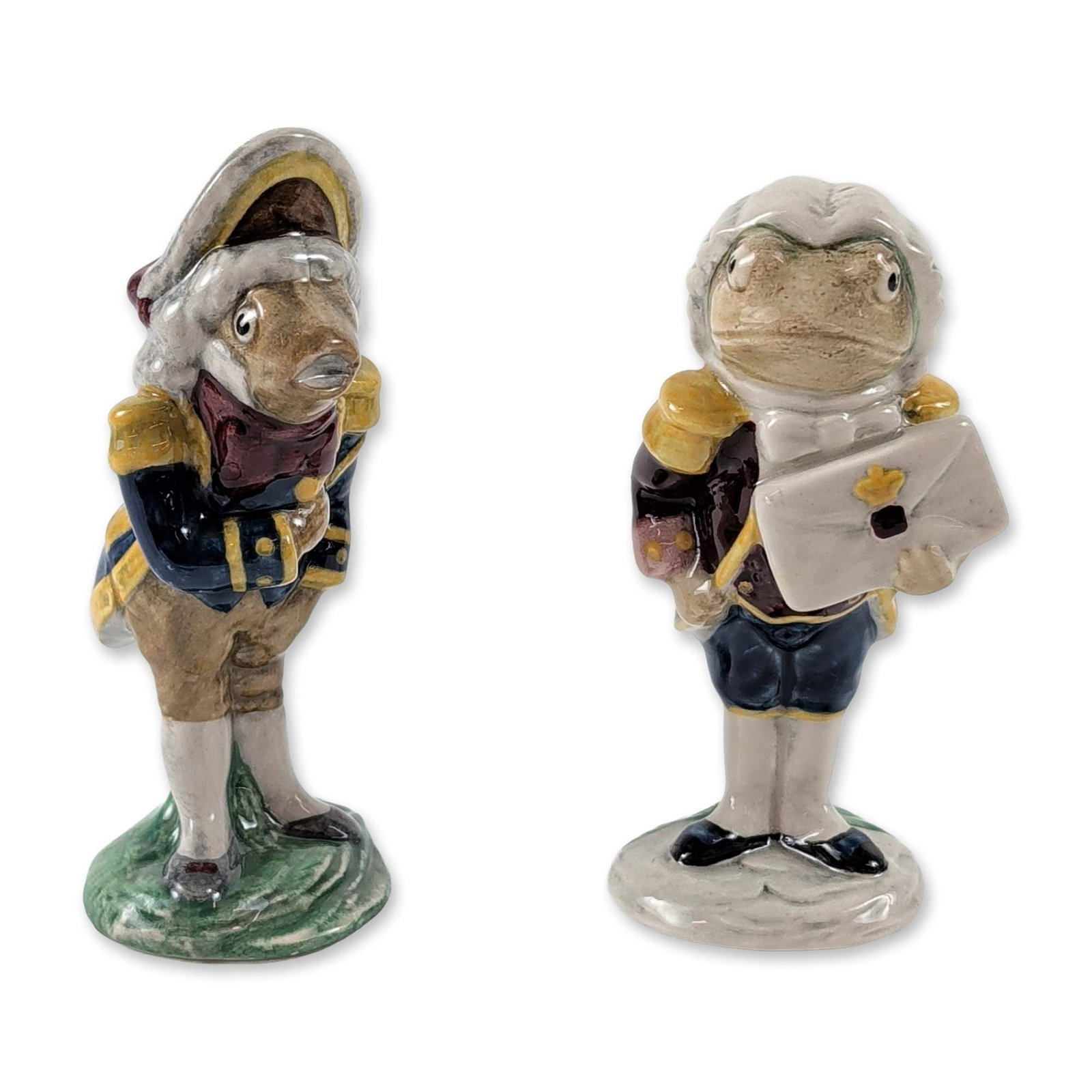 Beswick Alice Series Ceramic Footman Figurines: Pair of Beswick glazed ceramic figurines from the Alice Series, featuring the Frog Footman and the Fish Footman. The figures are modeled in 18th-century style livery with high-gloss glazed finishes. T