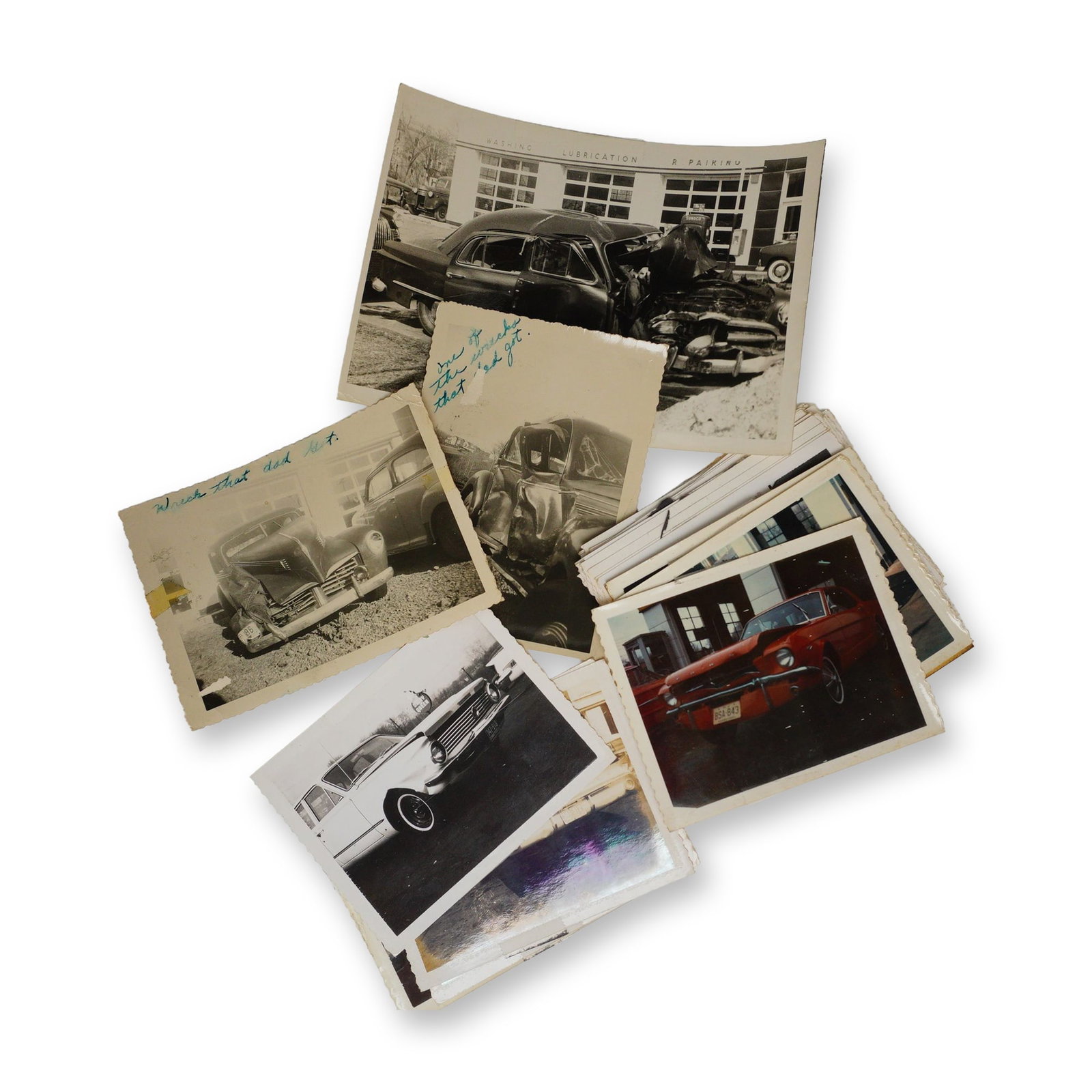 Lot of 52 Photos of Early Car Wrecks & Towing Snapshots c. 1950s-1960s: This is a remarkably detailed archive of 52 original vintage photographs chronicling mid-century automobile accidents, salvage operations, and towing yard scenes. This extensive collection serves as a