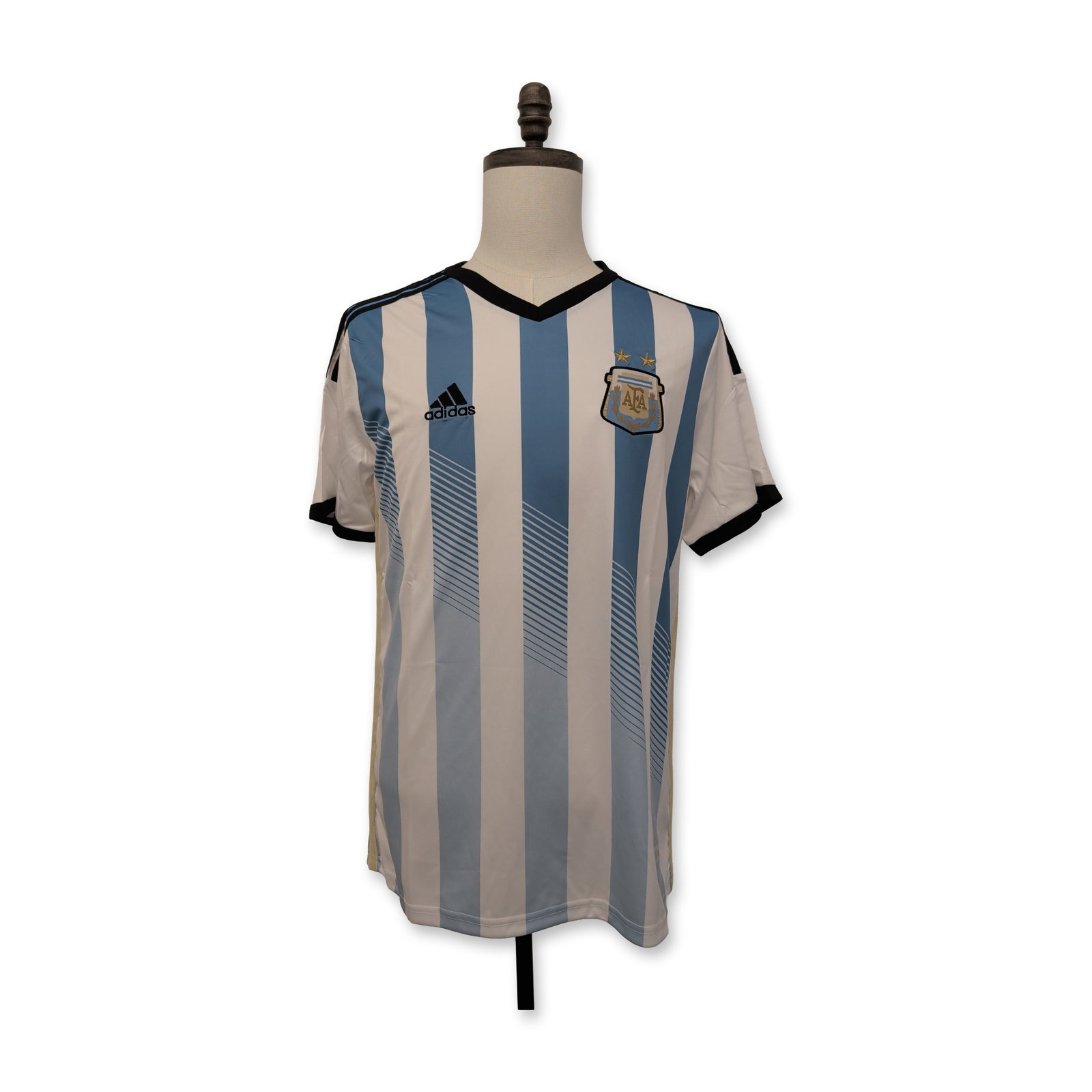 Lionel Messi Signed Argentina Soccer Jersey: Adidas Argentina national team 2018 home soccer jersey in polyester, featuring light blue and white vertical stripes with pixelated graphic accents, a black V-neck collar, and black sleeve trim. Front