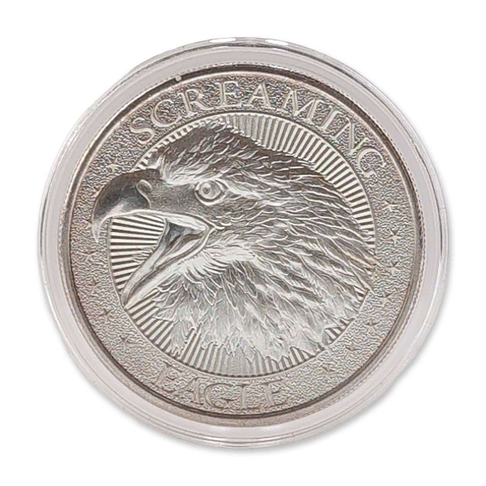 2020 Intaglio Mint .999 Fine Silver Screaming Eagle Round: US 2020 silver bullion round produced by the Intaglio Mint. The obverse features a high-relief profile of an eagle head with an open beak set against a background of radial lines, with incuse inscript