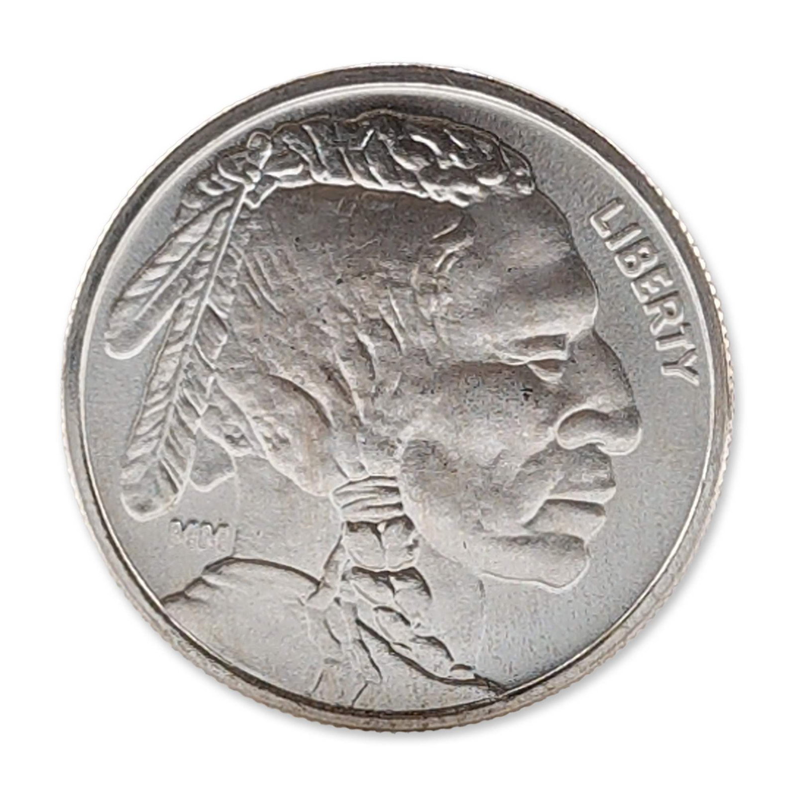 US .999 Silver Buffalo Round: US silver bullion round in .999 fine silver. The round features the James Earle Fraser Buffalo Nickel design with an Indian Head obverse and Buffalo reverse. Inscriptions include LIBERTY, ONE TROY OUN