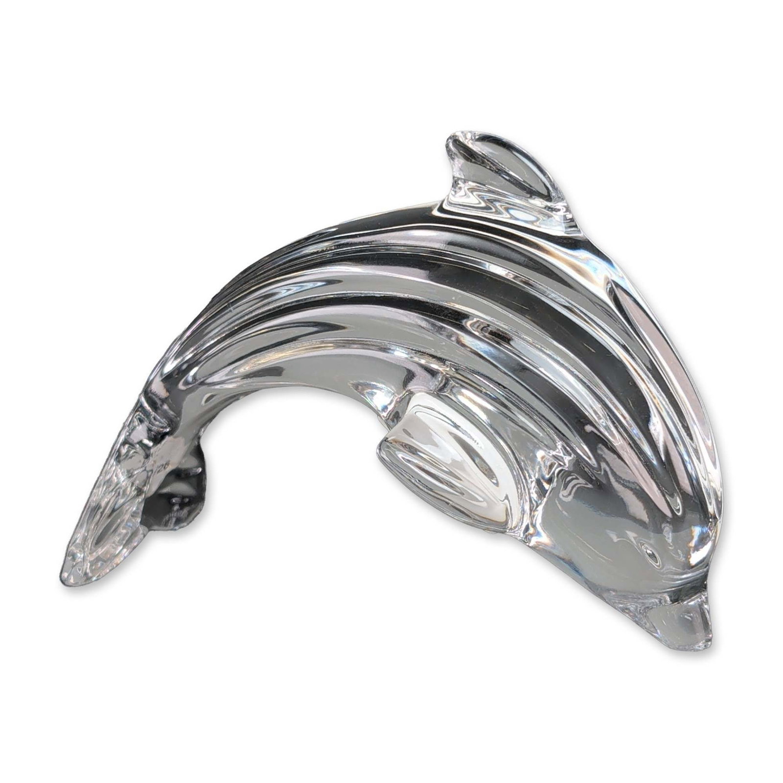 Waterford Crystal Leaping Dolphin Figurine: Waterford Crystal. Leaping dolphin figurine in clear lead crystal, featuring a stylized curved body and arching tail. Includes acid-etched Waterford mark with seahorse logo and manufacturer labels. Ac