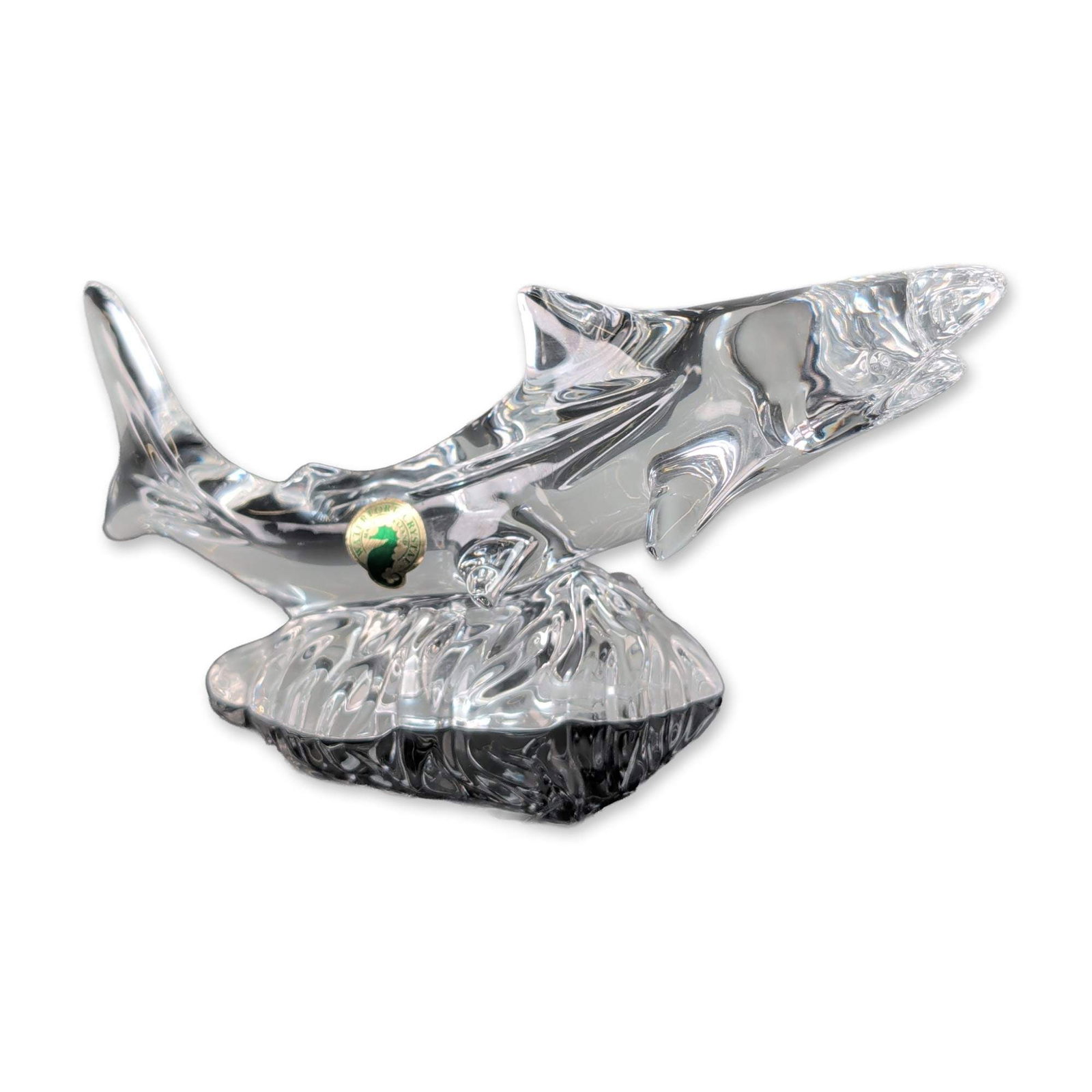 Waterford Crystal Shark Figurine: Waterford clear lead crystal figurine depicting a Shark emerging from a stylized splashing wave base. The piece features faceted details and includes the original grey presentation box with silver-ton
