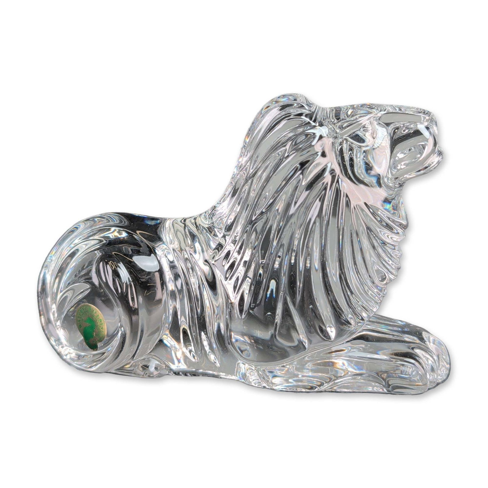 Waterford Crystal Lion Figurine Paperweight: Waterford Crystal figurative sculpture in clear polished crystal, depicting a stylized lion with a flowing, deeply grooved mane. The piece features a broad flat base designed for use as a figurine or 