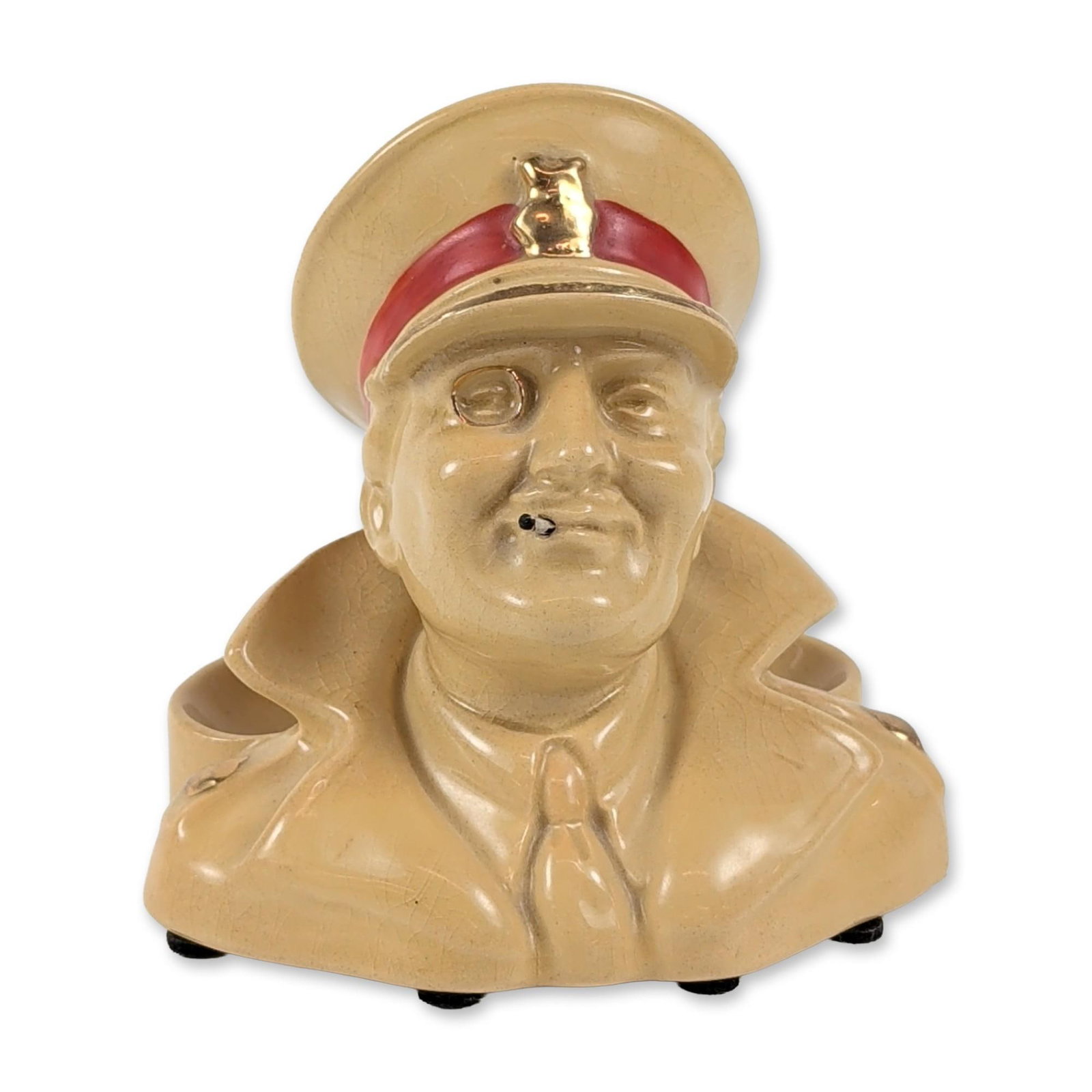 Royal Doulton Ceramic Army Club Advertising Ashtray: Royal Doulton. Character ashtray in glazed earthenware, produced as a promotional item for Army Club Cigarettes. The piece depicts the brand mascot known as "The Major" wearing a peaked cap with a red