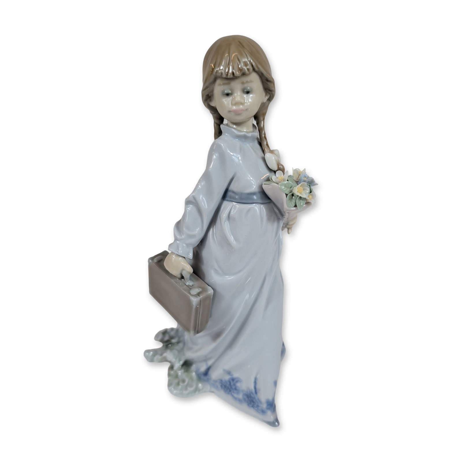 Lladro School Days 7604 Porcelain Figurine: Lladro porcelain figurine, model number 7604, titled School Days or Flores a la Maestra. Glazed polychrome figure of a young schoolgirl with braided hair tied in white bows, wearing a light blue dress