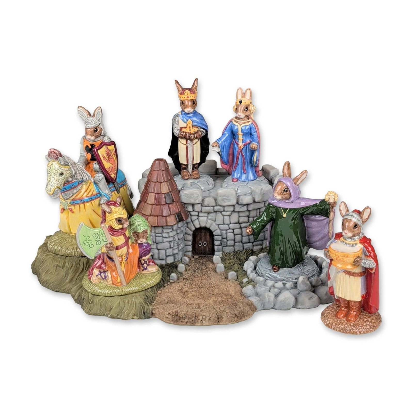 7pc Royal Doulton Bunnykins Arthurian Legends Set: Royal Doulton. Set of seven pieces from the Bunnykins Arthurian Legends collection, crafted in hand-painted porcelain. The grouping includes King Arthur (DB 304), Queen Guinevere (DB 302), Merlin (DB 
