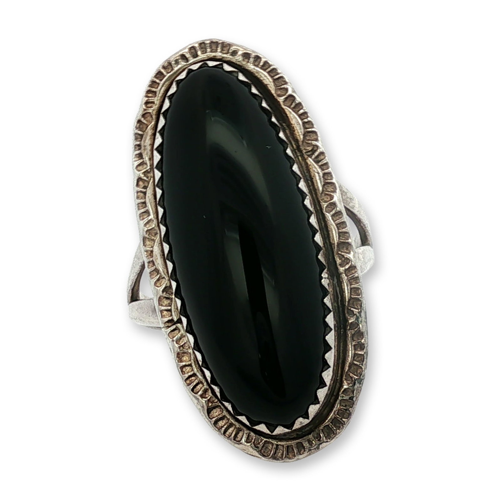 CLAW Southwestern Sterling Silver Black Onyx Ring: Southwestern style statement ring by CLAW. Sterling silver construction featuring a large, elongated oval black onyx cabochon. The center stone is secured in a sawtooth bezel and framed by a decorativ