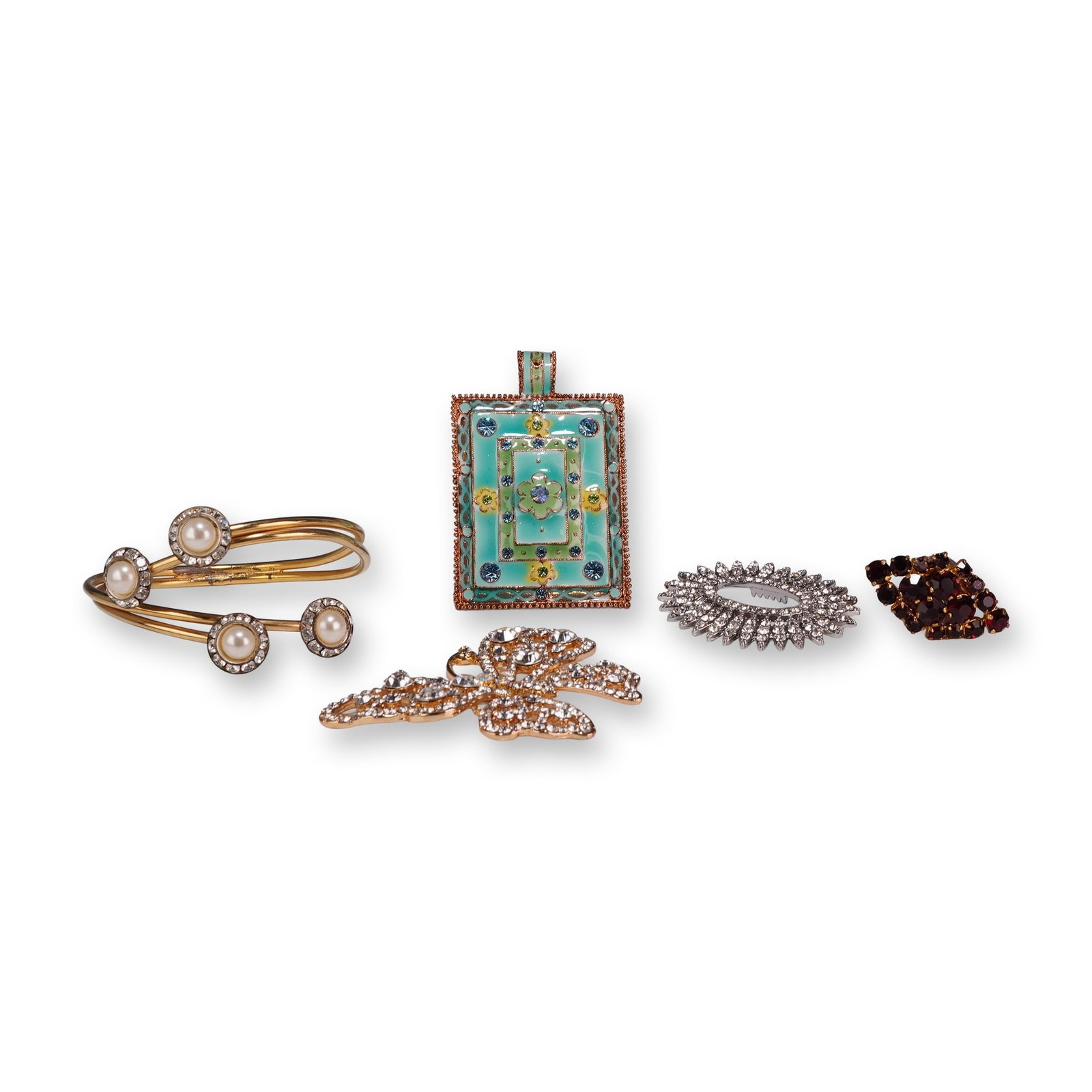 5pc Costume Jewelry Collection Including Three Pendants, Ring, and Bracelet: This collection of costume jewelry includes five pieces featuring various designs and materials. The assembly contains three pendants, a ring, and a bracelet. One pendant is a large rectangular piece