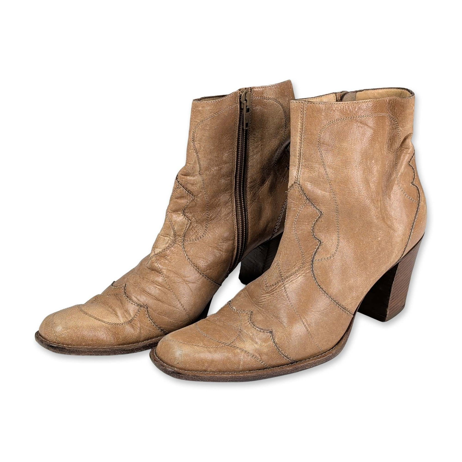 Pair of Duccio Del Duca Italian Leather Western Ankle Boots, Vero Cuoio: A pair of Western-inspired ankle boots in tan leather, featuring decorative topstitching across the vamps and shafts. The boots are designed with almond-shaped toes, side zip closures, and mid-height