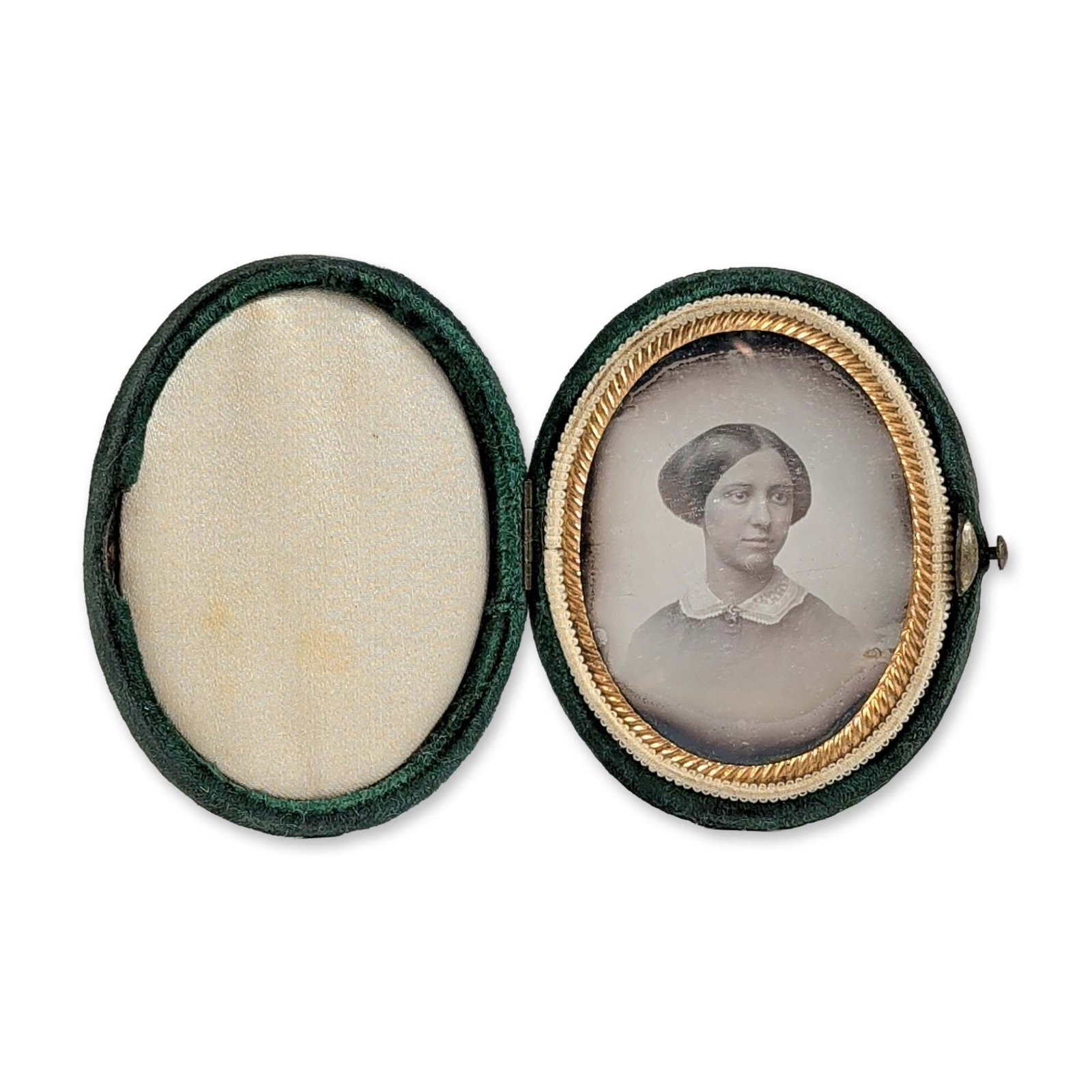 Nineteenth Century Cased Oval Portrait Daguerreotype of Rebecca Bacon: Nineteenth century oval portrait daguerreotype depicting Rebecca Bacon, housed in a green velvet case with a gold-tone rope-twist bezel and an accompanying handwritten identification note stating prov
