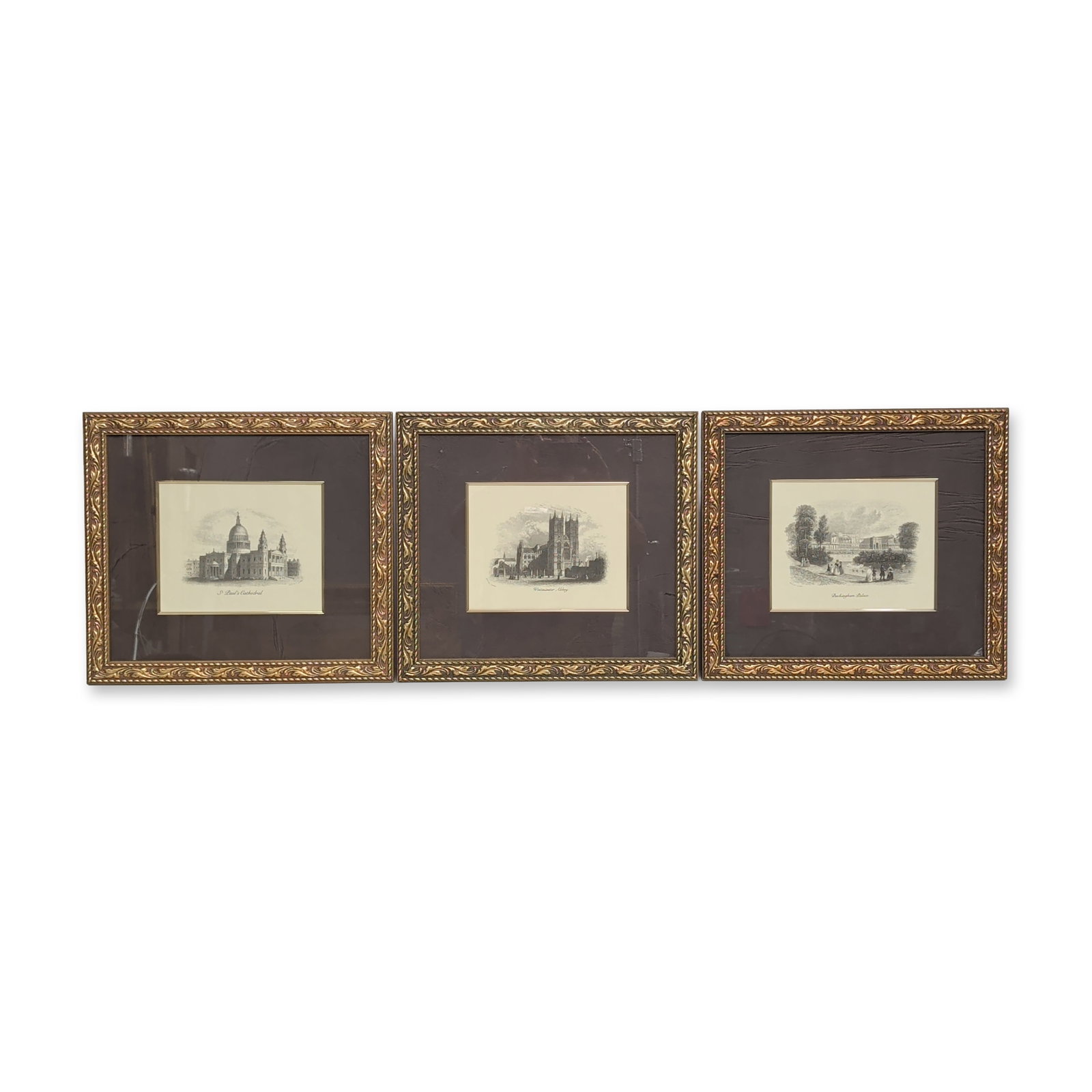 Three Rock and Co. London, Framed Prints, Engraved by Unknown: Mid-Victorian. Trio of steel engravings on paper featuring topographical views of St. Pauls Cathedral, Westminster Abbey, and Buckingham Palace. Each work is presented as a vignette showing architectu