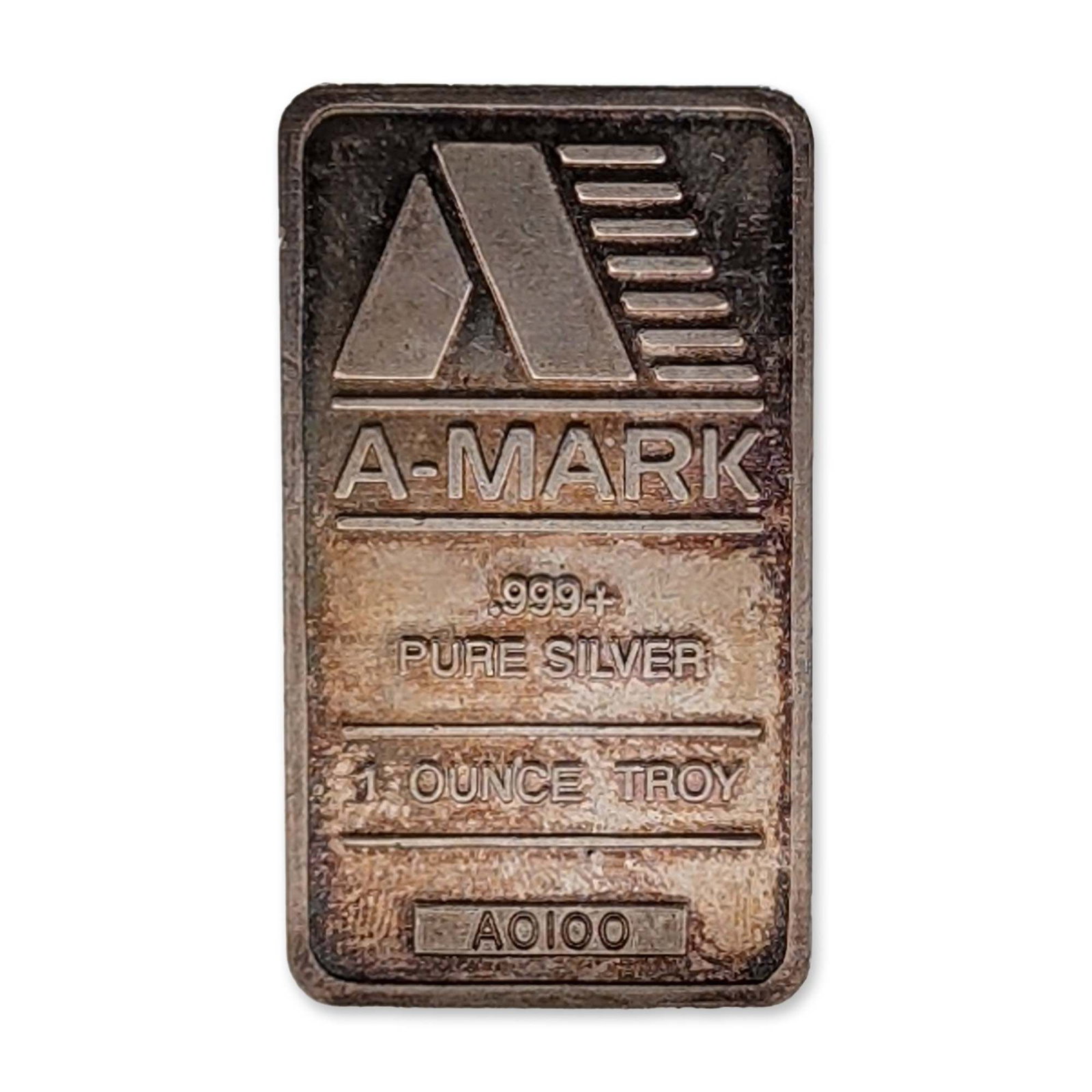 A-Mark .999 Fine Silver Bullion Bar: A-Mark Precious Metals vintage silver bullion bar in .999+ fine silver. The obverse is stamped with the maker logo and text indicating weight and purity, featuring a recessed box with serial number AO