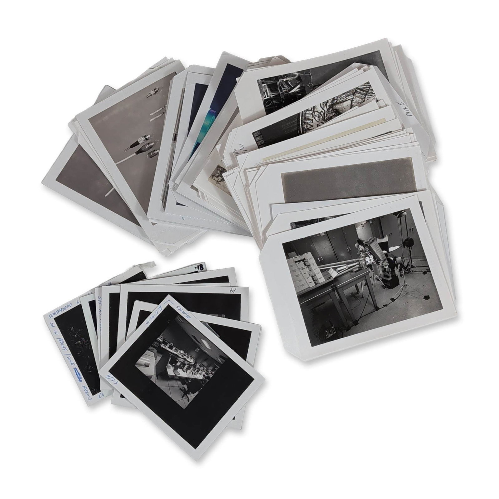 Collection of Vintage Industrial Polaroid Photographs: Collection of vintage black and white silver gelatin Polaroid instant pack film photographs, appearing to date from the late 1980s to early 1990s. The lot contains an assortment of technical documenta