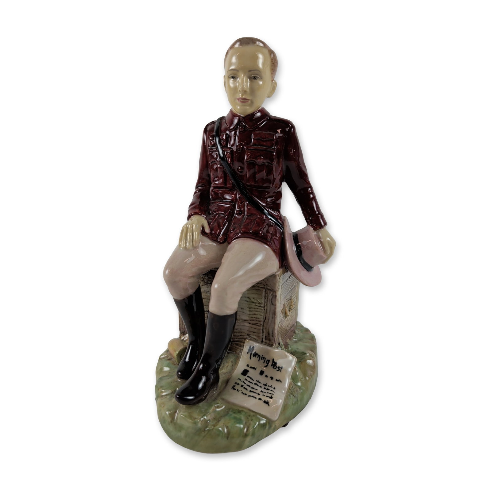 Kevin Francis Winston Churchill Artist Proof Figurine: Kevin Francis Ceramics. Figurine in polychrome glazed ceramic, featuring a young Winston Churchill as a war correspondent for the Morning Post seated on a wooden crate in a burgundy military-style tun