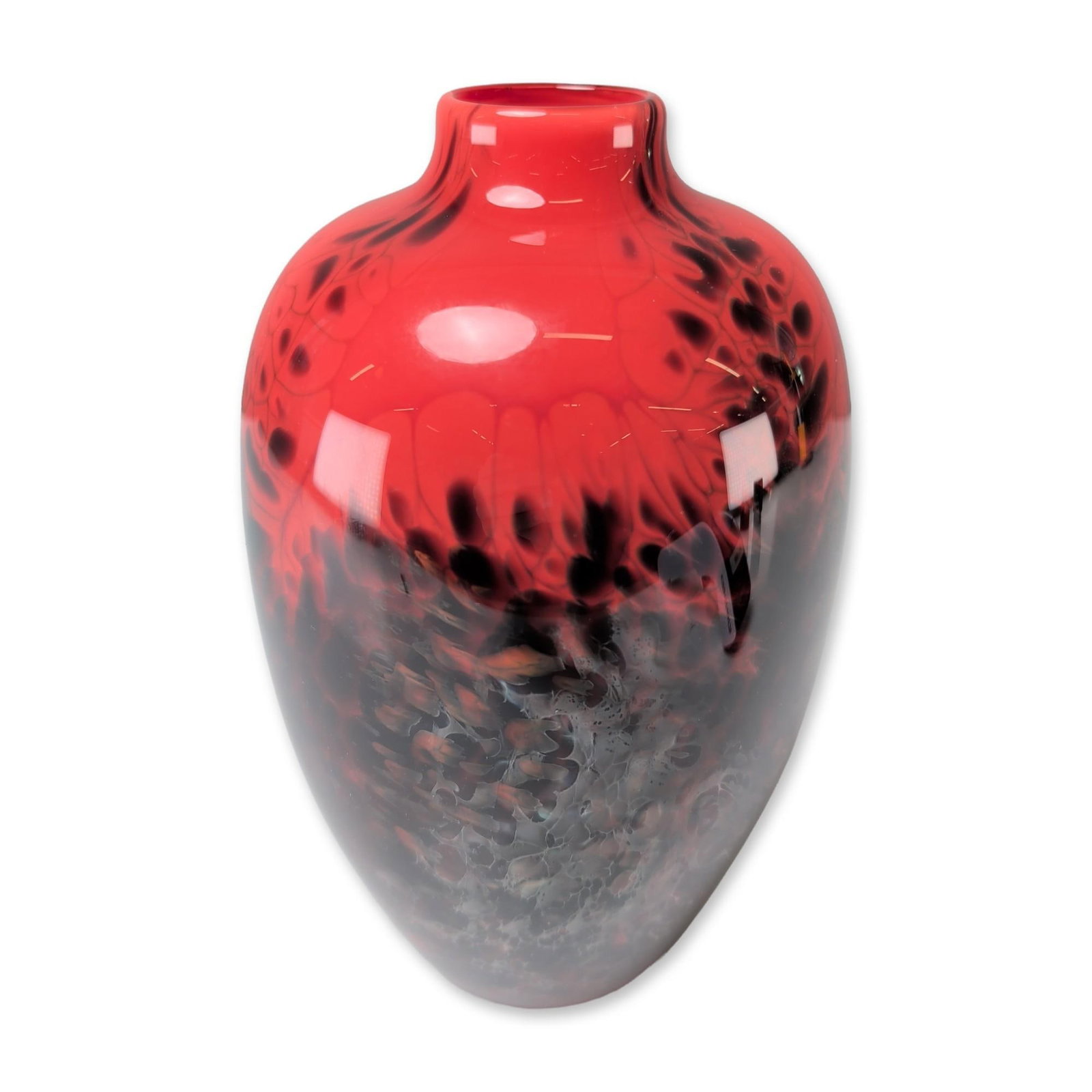Hugh Jenkins and Stephanie Ross Hawaii Art Glass Vase: Hugh Jenkins and Stephanie Ross hand-blown art glass vase of ovoid form, featuring a two-tone lava aesthetic. The translucent red upper shoulder and neck transition into a mottled charcoal and black l