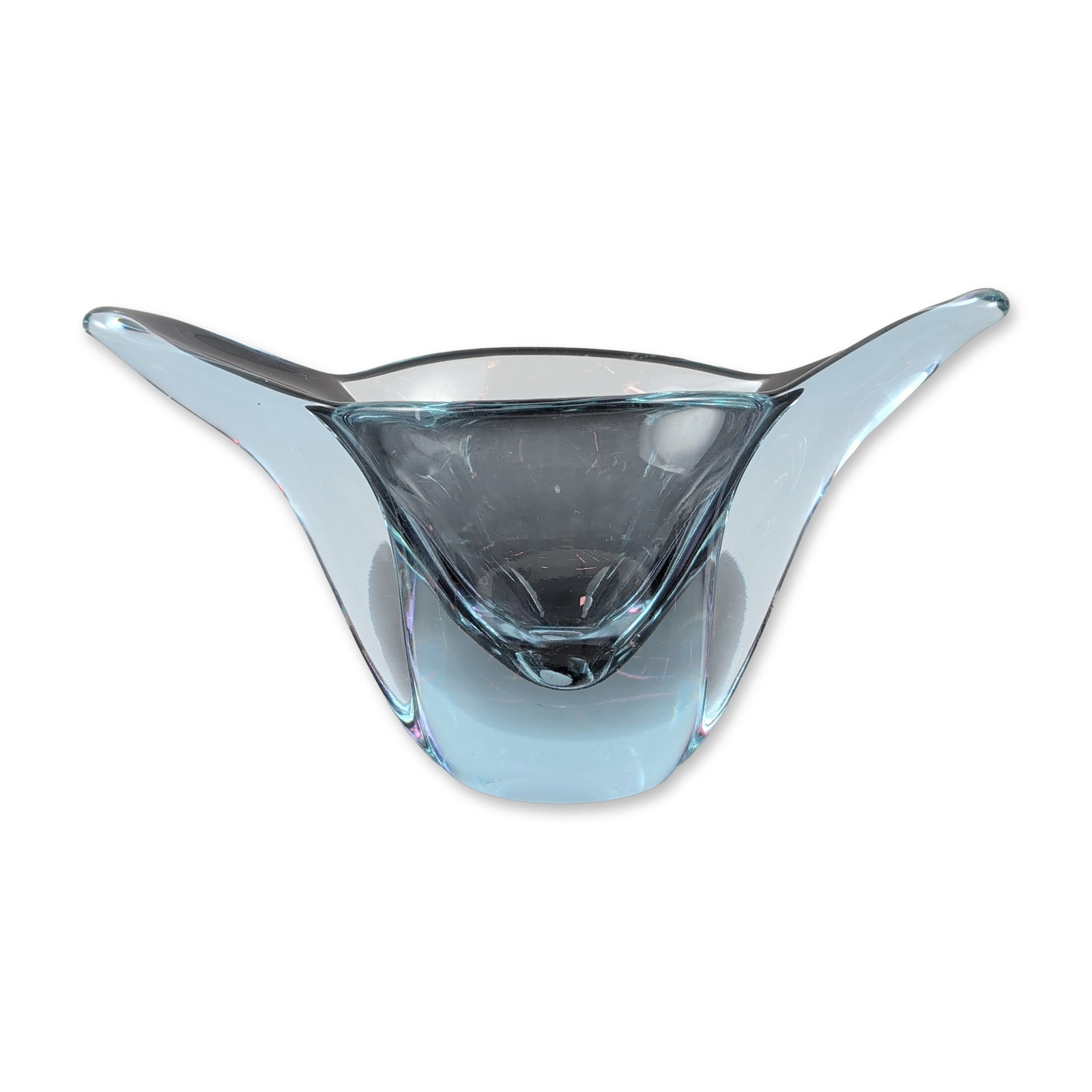 Attributed to Tiffin Neodymium Art Glass Vase: This mid-century modern vessel is crafted in a light aqua blue/lavender glass, featuring a heavy solid base that tapers upward into an organic form with two rounded, wing-like points at the rim. The p