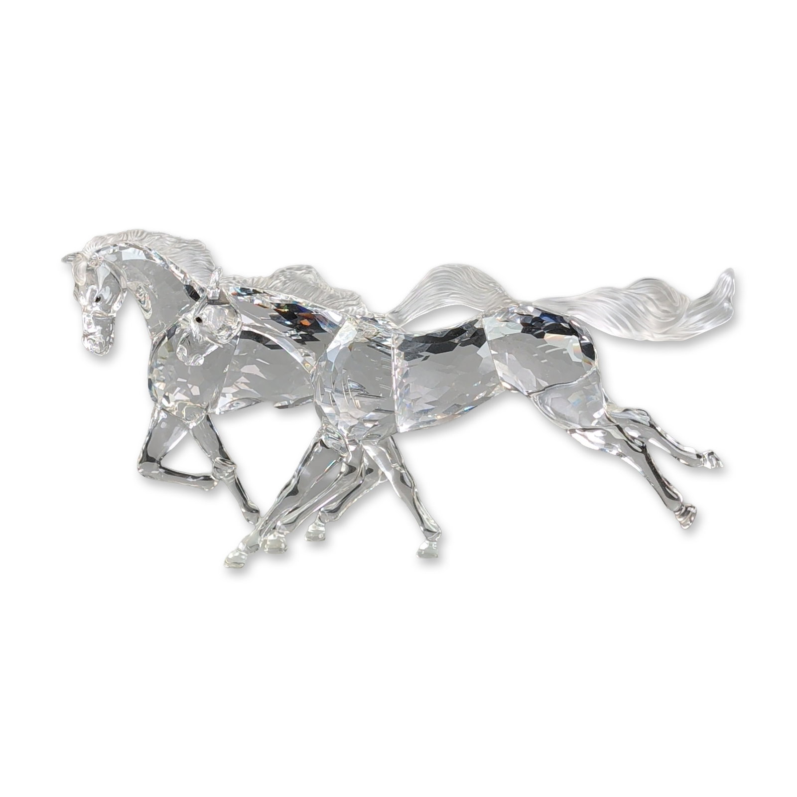 Swarovski Crystal 2001 Limited Edition Sculpture, Wild Horses: Swarovski Silver Crystal limited edition sculpture titled The Wild Horses (Spirit of Freedom), designed by Martin Zendron and released in 2001. The work depicts a trio of wild horses in dynamic poses,