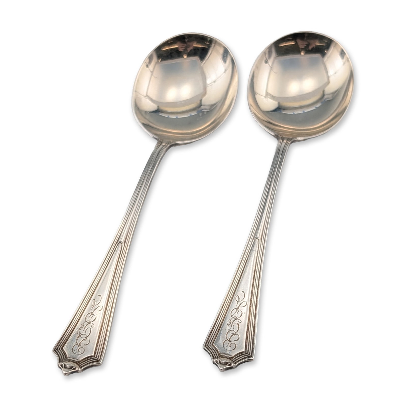 Pair of Gorham Plymouth Sterling Silver Spoons: Gorham Manufacturing Company (Providence, Rhode Island). Pair of sterling silver bouillon or cream soup spoons in the Plymouth pattern, patented 1911. Each spoon features a round bowl and tapered hand