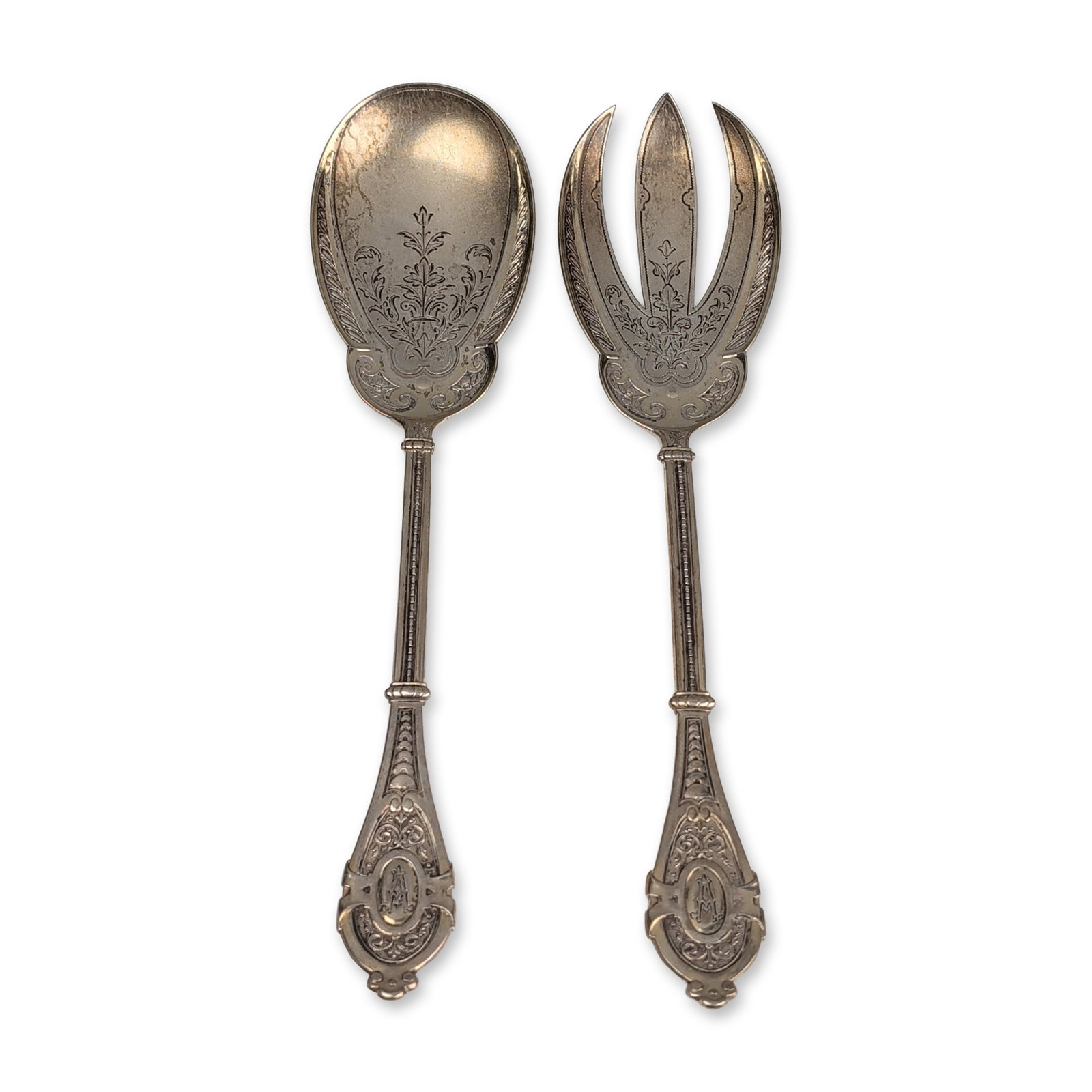 Two Piece German 800 Silver Salad Serving Set: German Neoclassical style salad serving set in 800 silver, late 19th or early 20th century. Includes a matching serving spoon and three-tined serving fork. Handles feature spatulate terminals with bea