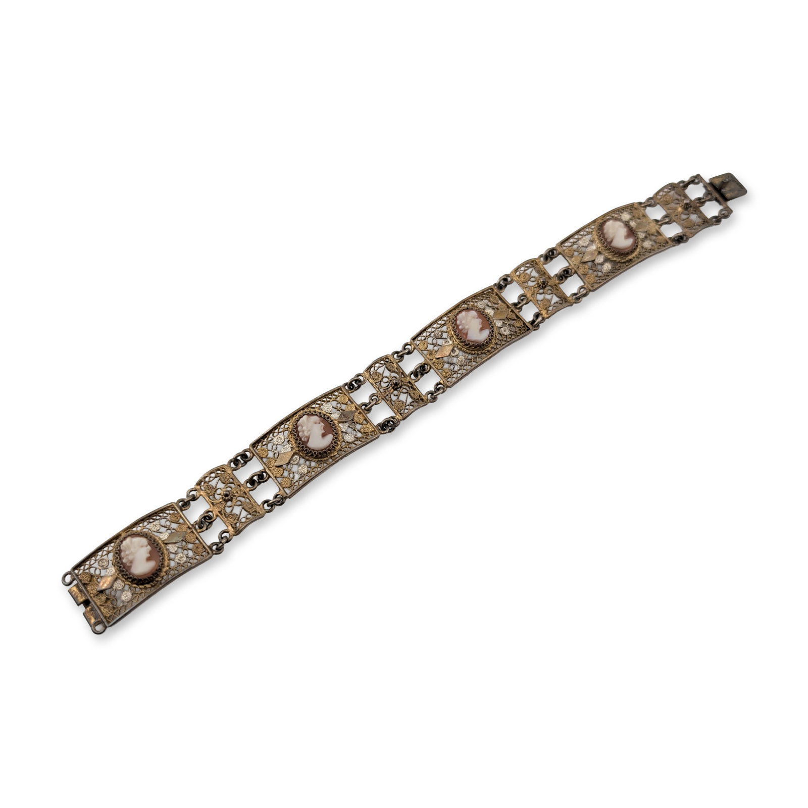 Skiathitis Bros Greek 800 Silver Filigree Cameo Bracelet: Skiathitis Bros, Rhodes, Greece, hand-made link bracelet constructed from 800 silver with 8-karat gold. The piece features four rectangular filigree panels showcasing intricate scrollwork and floral m
