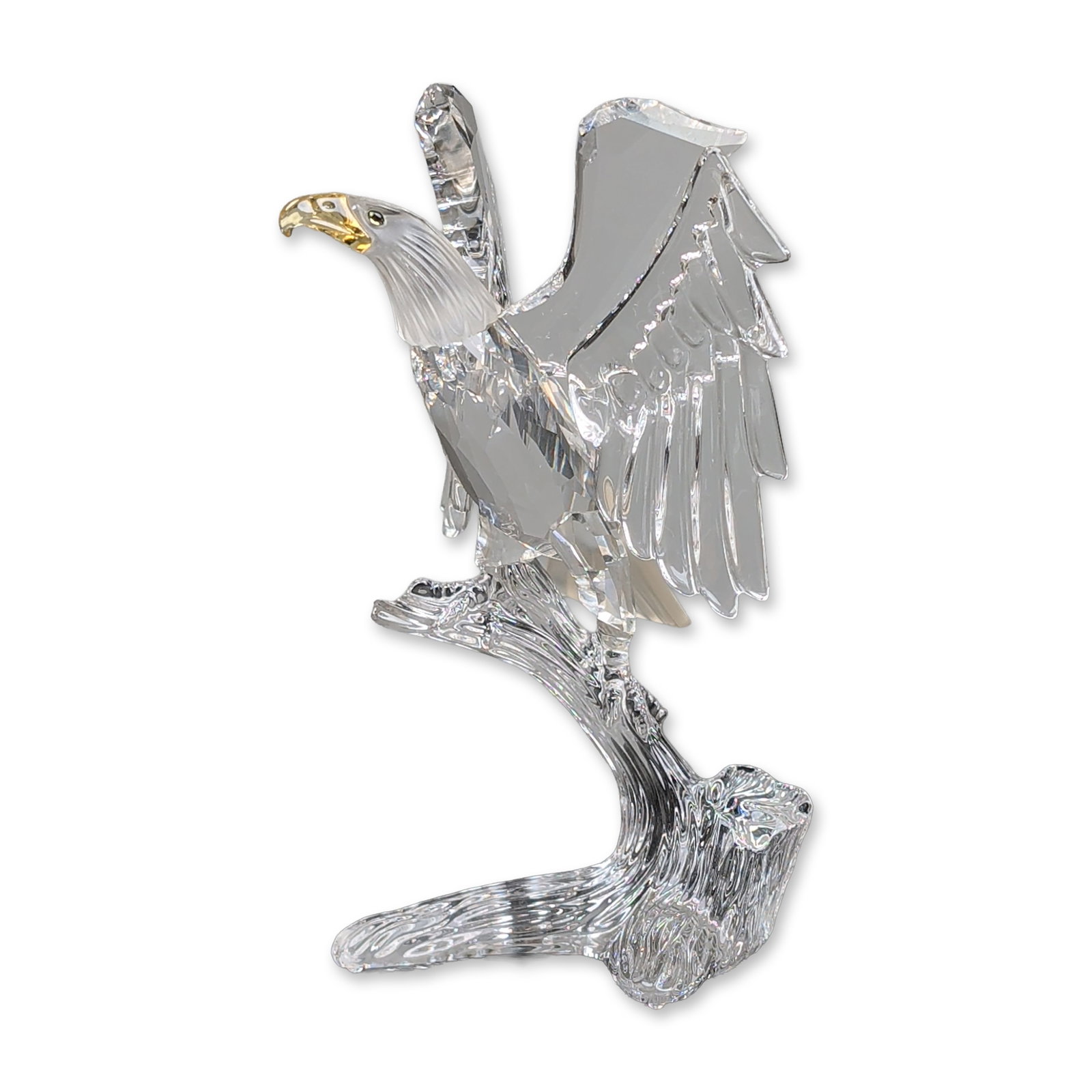 Swarovski Silver Crystal Figurine, Bald Eagle: Swarovski Silver Crystal bald eagle figurine designed by Adi Stocker released in 2000. The piece features a faceted clear crystal body and wings, with a contrasting frosted crystal head and tail