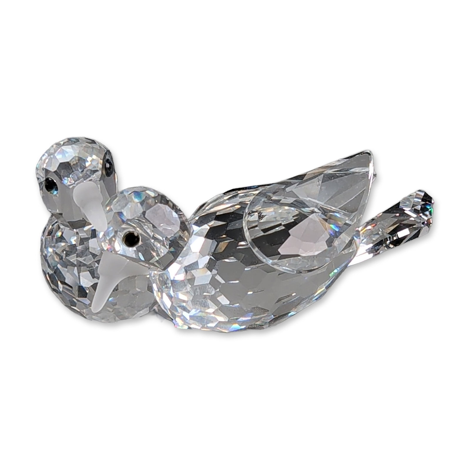 Swarovski Crystal 1987 Annual Edition Figurine, Turtledoves - Amour: Swarovski Collectors Society turtledoves are faceted and frosted lead crystal construction featuring a pair of birds perched on a frosted crystal branch. The birds are designed with faceted clear crys