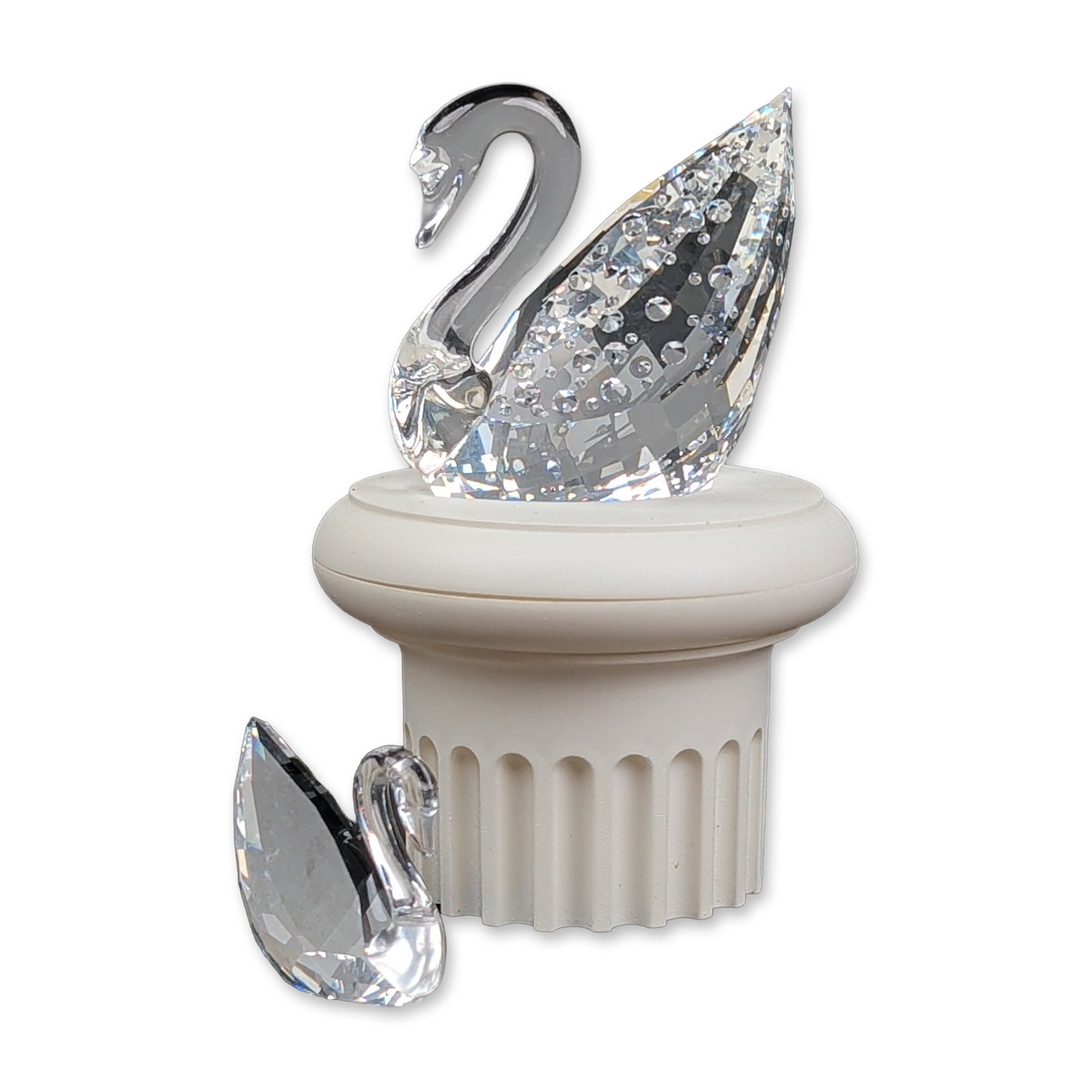 3pc Swarovski Centenary Faceted Crystal Swan Figurines with Base: Swarovski Silver Crystal Centenary swan figurines in faceted lead crystal, produced to commemorate the brand's 100th anniversary (1895-1995). The set includes a larger swan with a smooth crystal neck 